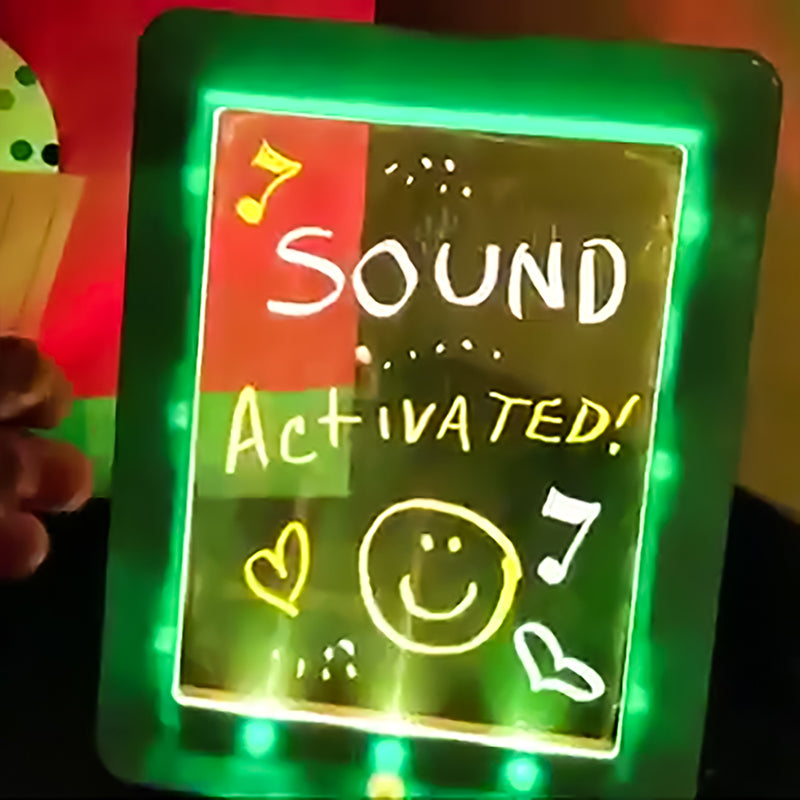 Disco Scribble Light-up Sound Activated Drawing Board with colorful LED lights and drawing accessories.