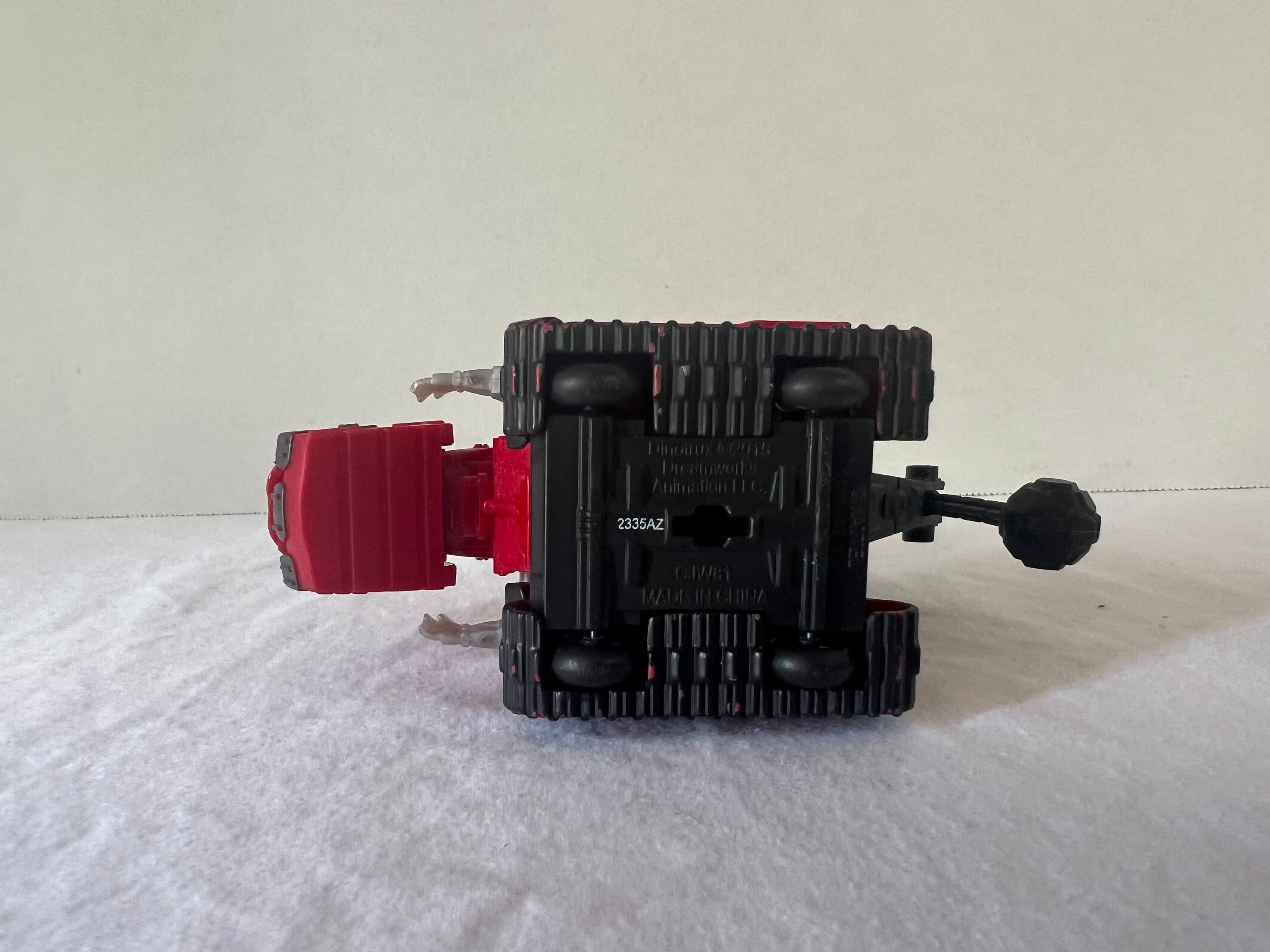 DreamWorks Dinotrux Diecast Vehicle set featuring Garby and Ty Rux action figures in vibrant colors.