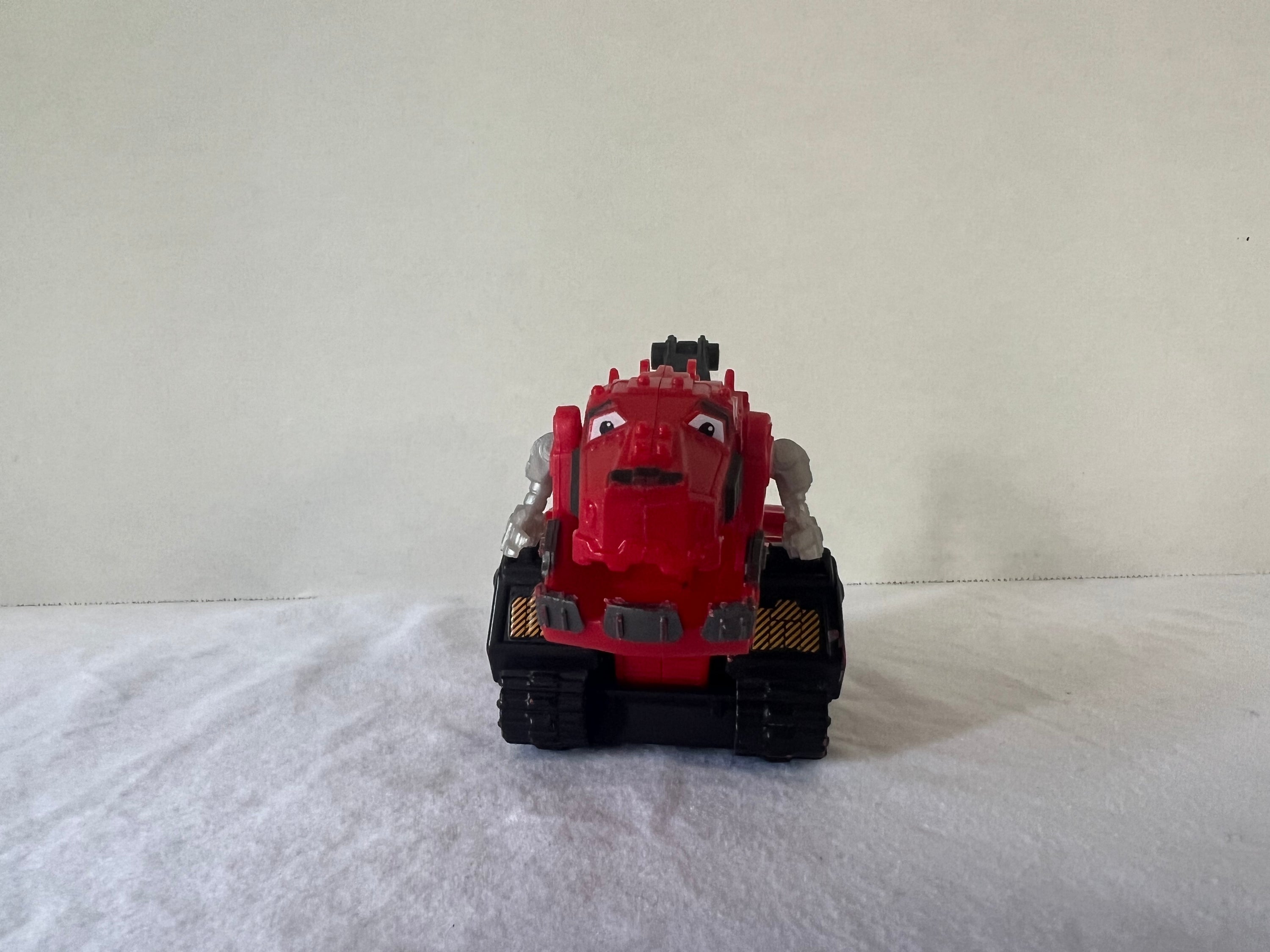 DreamWorks Dinotrux Diecast Vehicle set featuring Garby and Ty Rux action figures in vibrant colors.