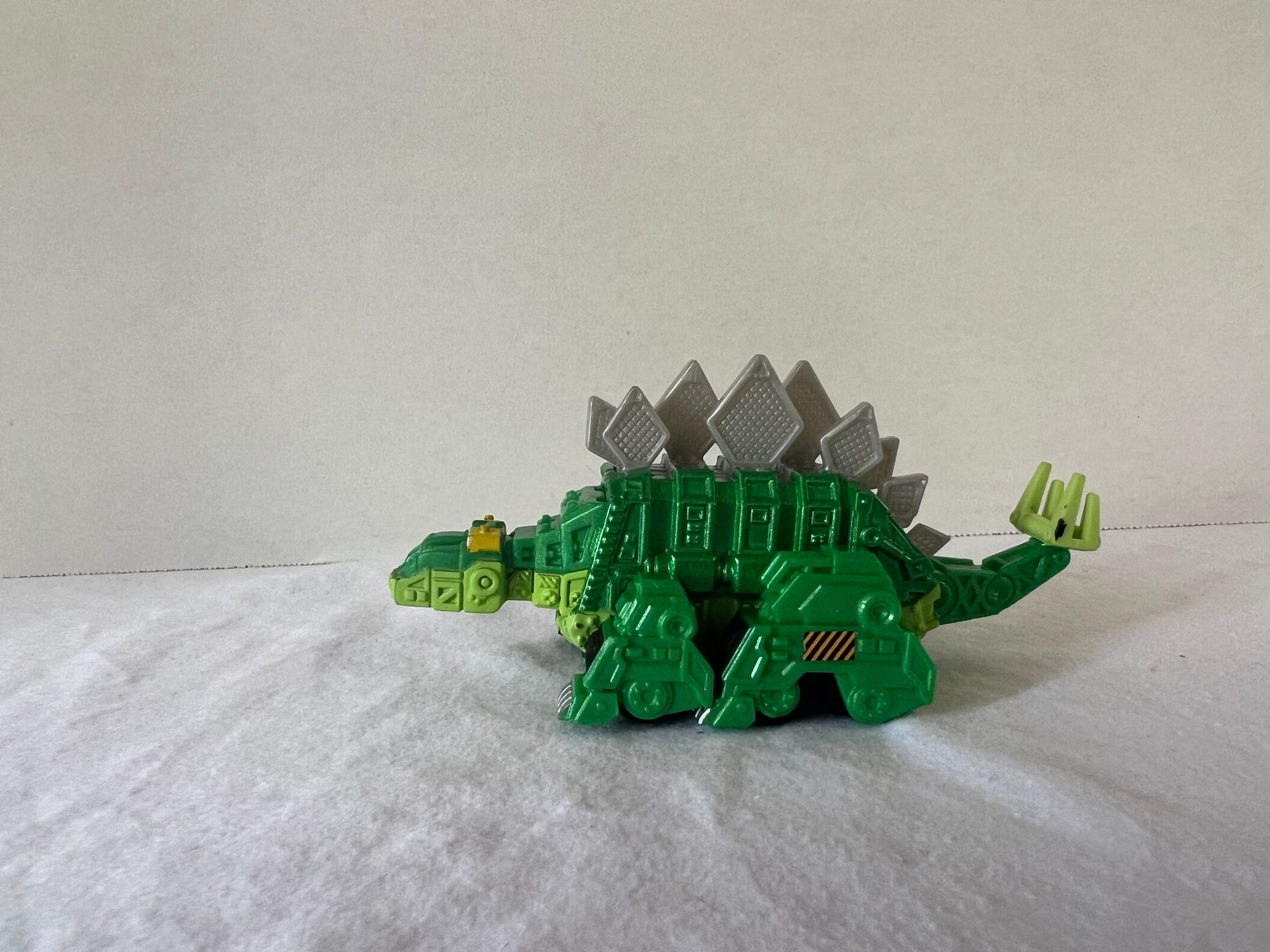 DreamWorks Dinotrux Diecast Vehicle set featuring Garby and Ty Rux action figures in vibrant colors.