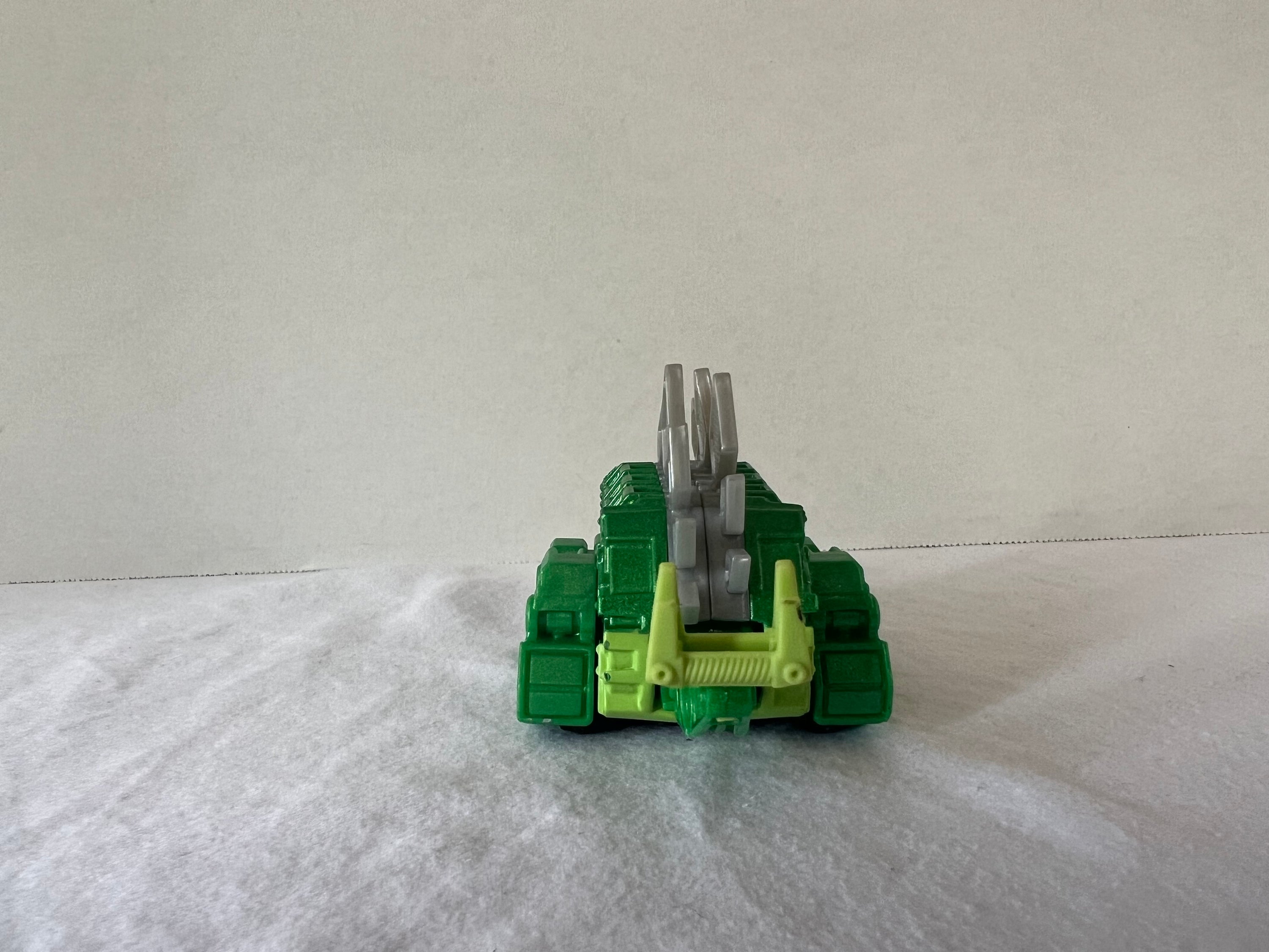 DreamWorks Dinotrux Diecast Vehicle set featuring Garby and Ty Rux action figures in vibrant colors.