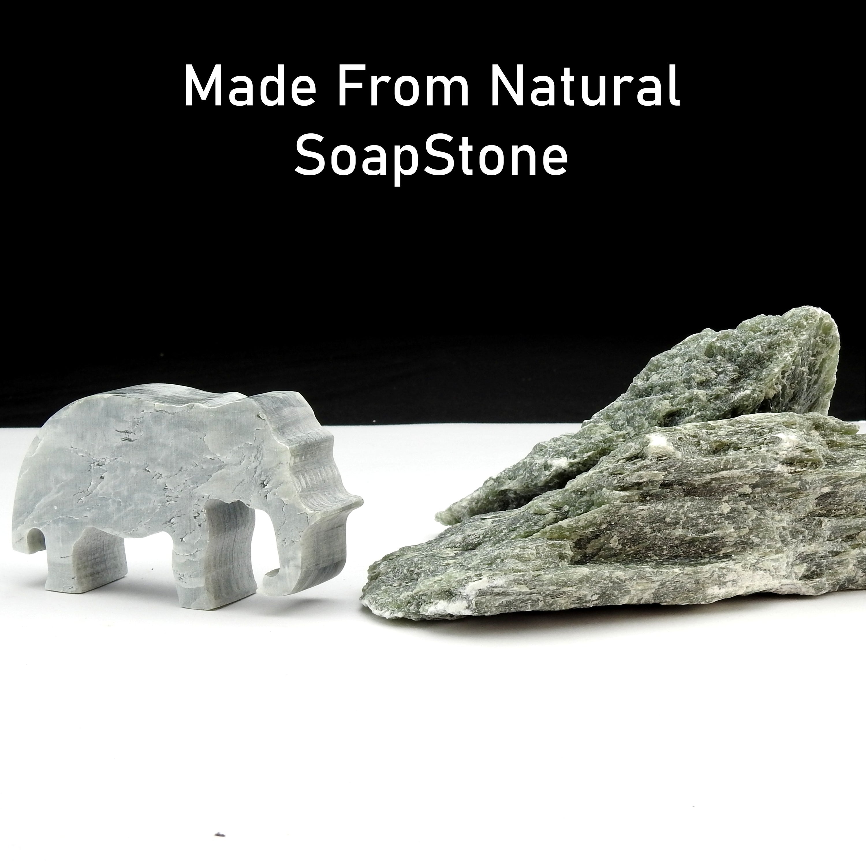 A complete Elephant Soapstone Carving Kit featuring precut soapstone, carving tools, sandpaper, wax, and a manual, ideal for kids and adults.