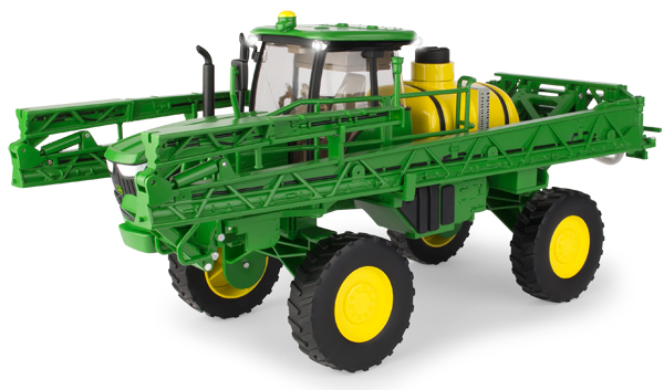 Green agricultural sprayer vehicle.