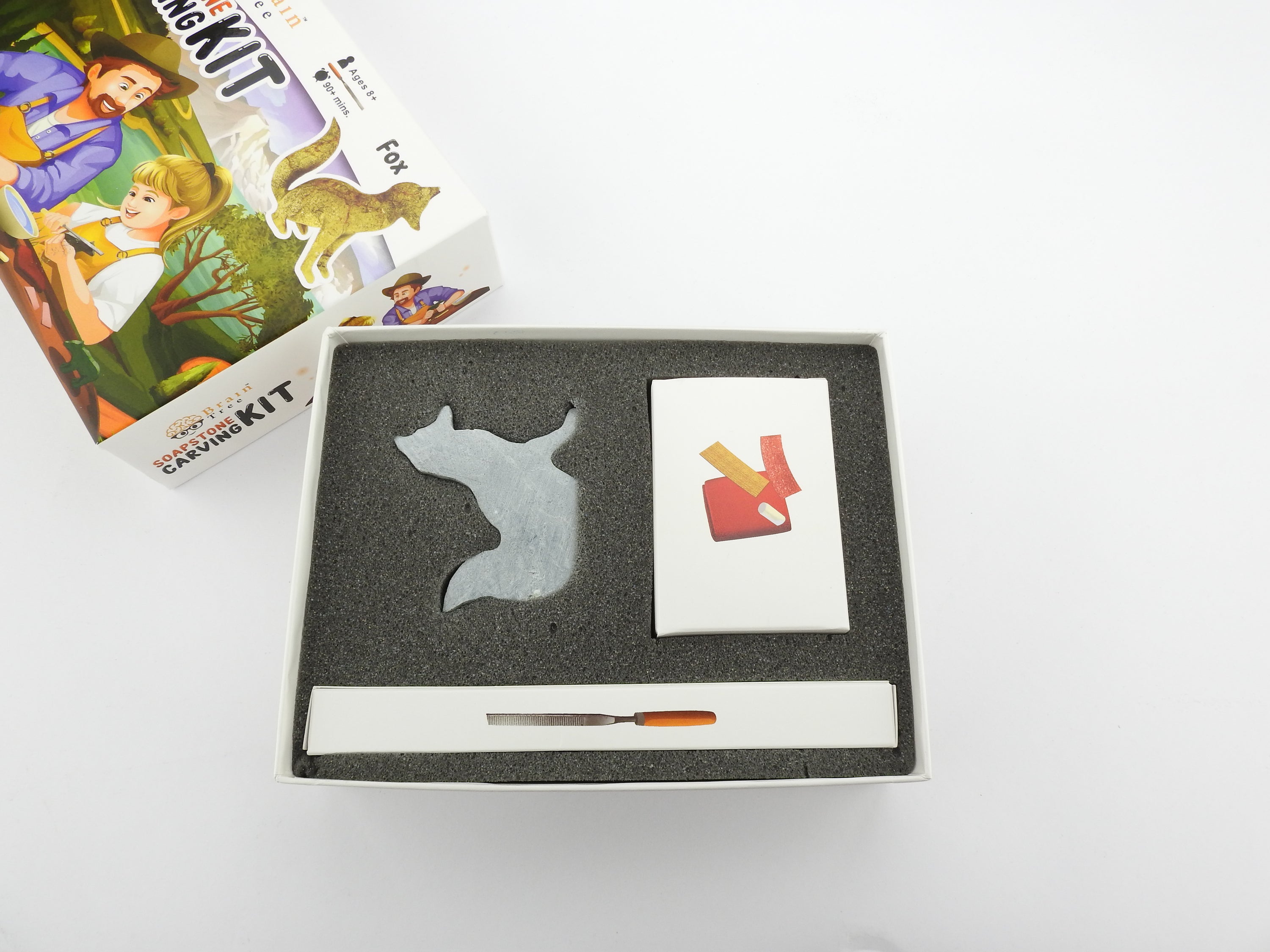 Fox Soapstone Carving Kit with tools and precut soapstone blocks, ideal for kids and adults to create beautiful sculptures.