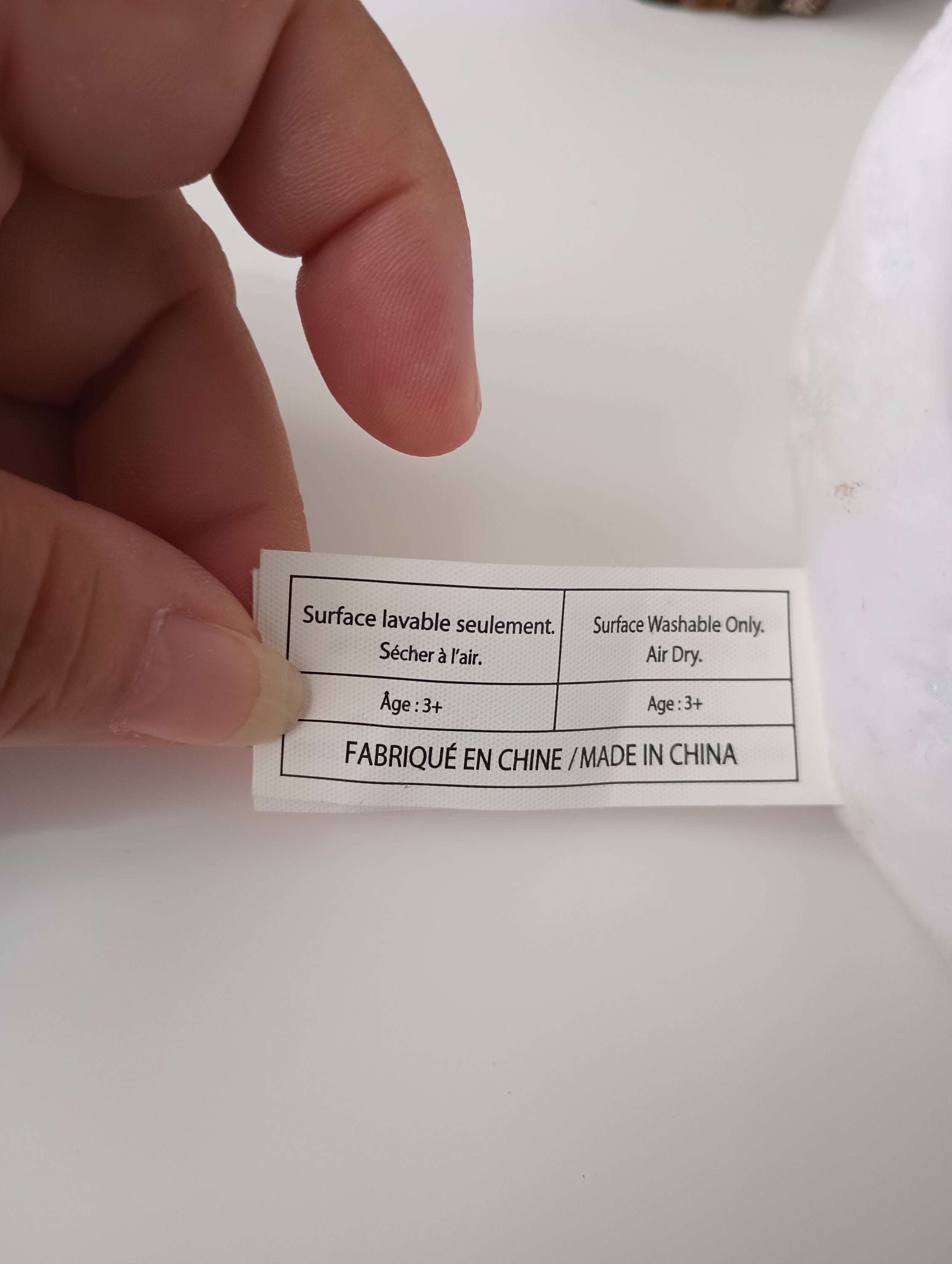 Frozen 9-inch Olaf stuffed animal from Disney, featuring a soft white design, perfect for children aged 3 and above.