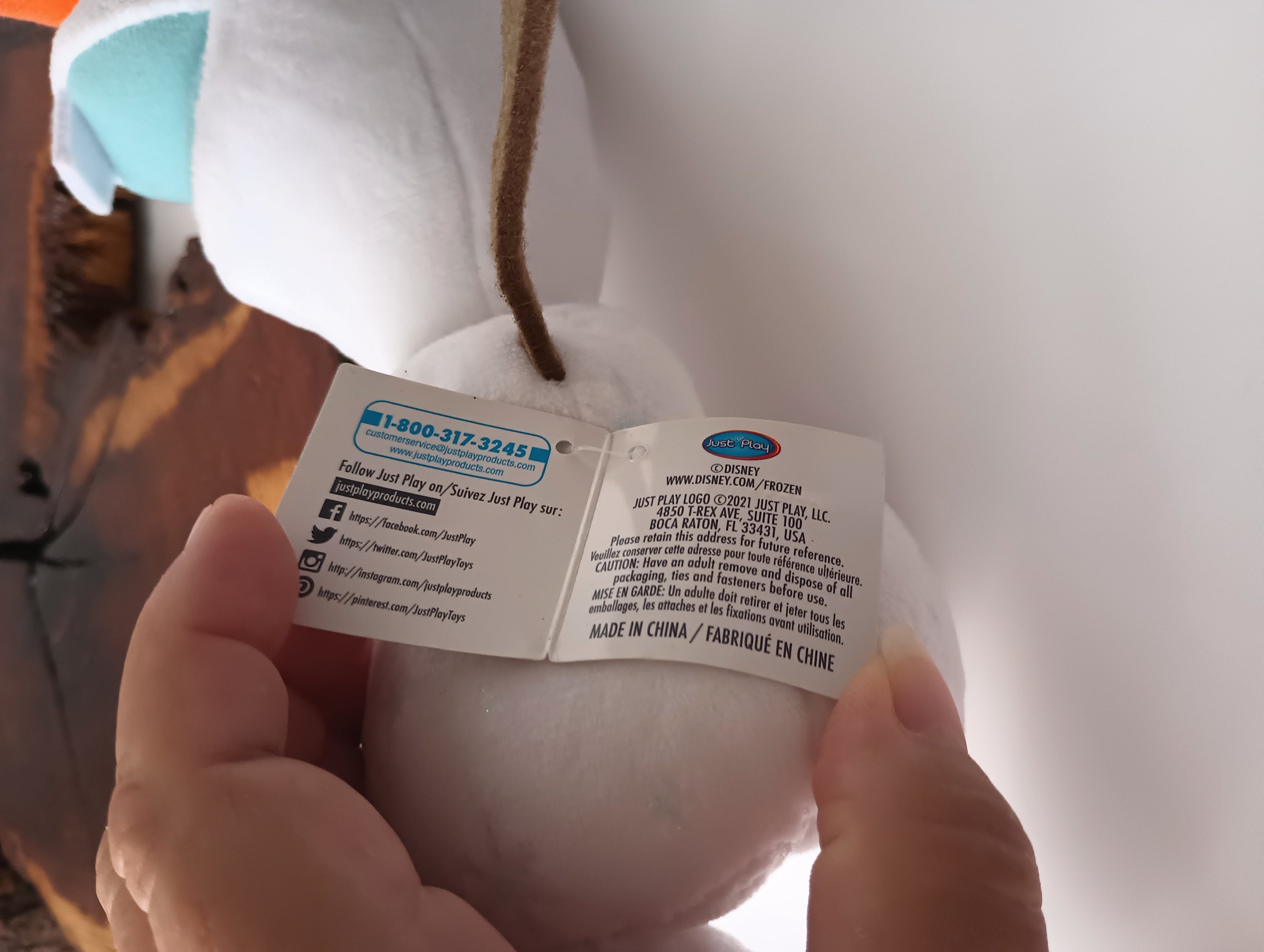 Frozen 9-inch Olaf stuffed animal from Disney, featuring a soft white design, perfect for children aged 3 and above.