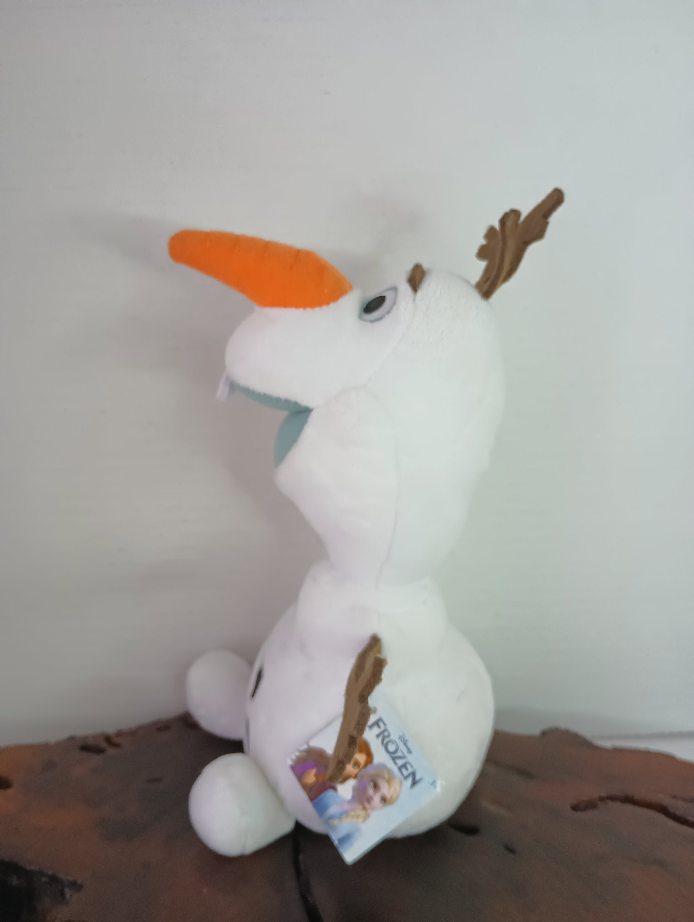 Frozen 9-inch Olaf stuffed animal from Disney, featuring a soft white design, perfect for children aged 3 and above.