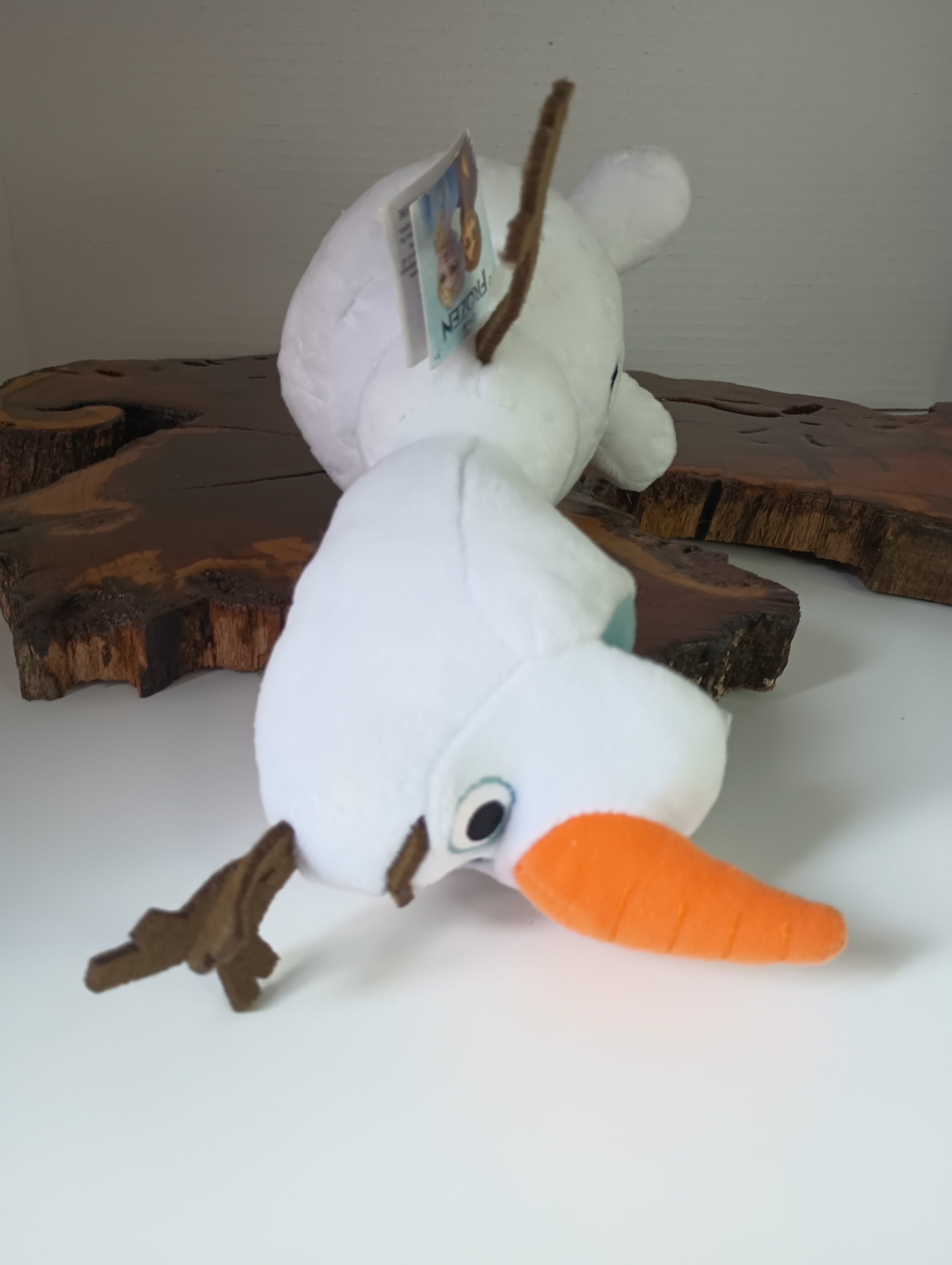 Frozen 9-inch Olaf stuffed animal from Disney, featuring a soft white design, perfect for children aged 3 and above.