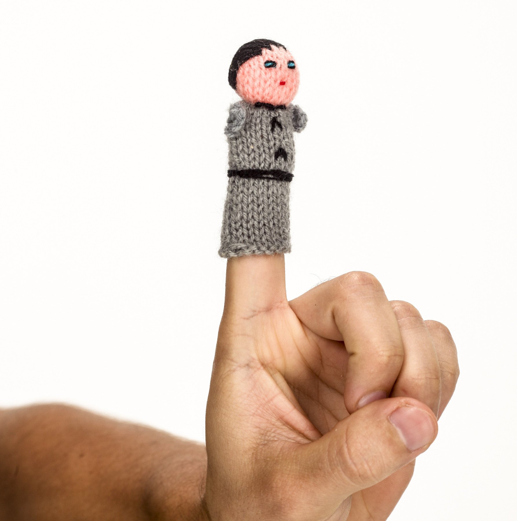 A colorful Groom Finger Puppet made from synthetic wool, showcasing intricate handcrafted details, perfect for imaginative play.