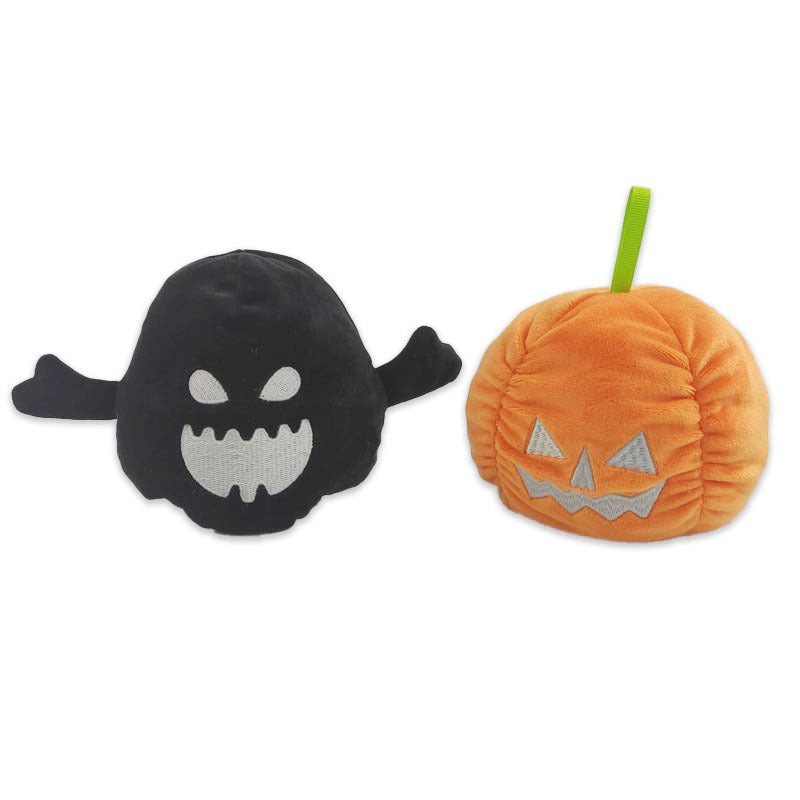 A cute Halloween Luminous Plush Toy featuring a reversible ghost design, showcasing its happy and angry sides with magnetic hands.