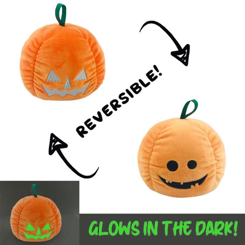 A cute Halloween Luminous Plush Toy featuring a reversible ghost design, showcasing its happy and angry sides with magnetic hands.