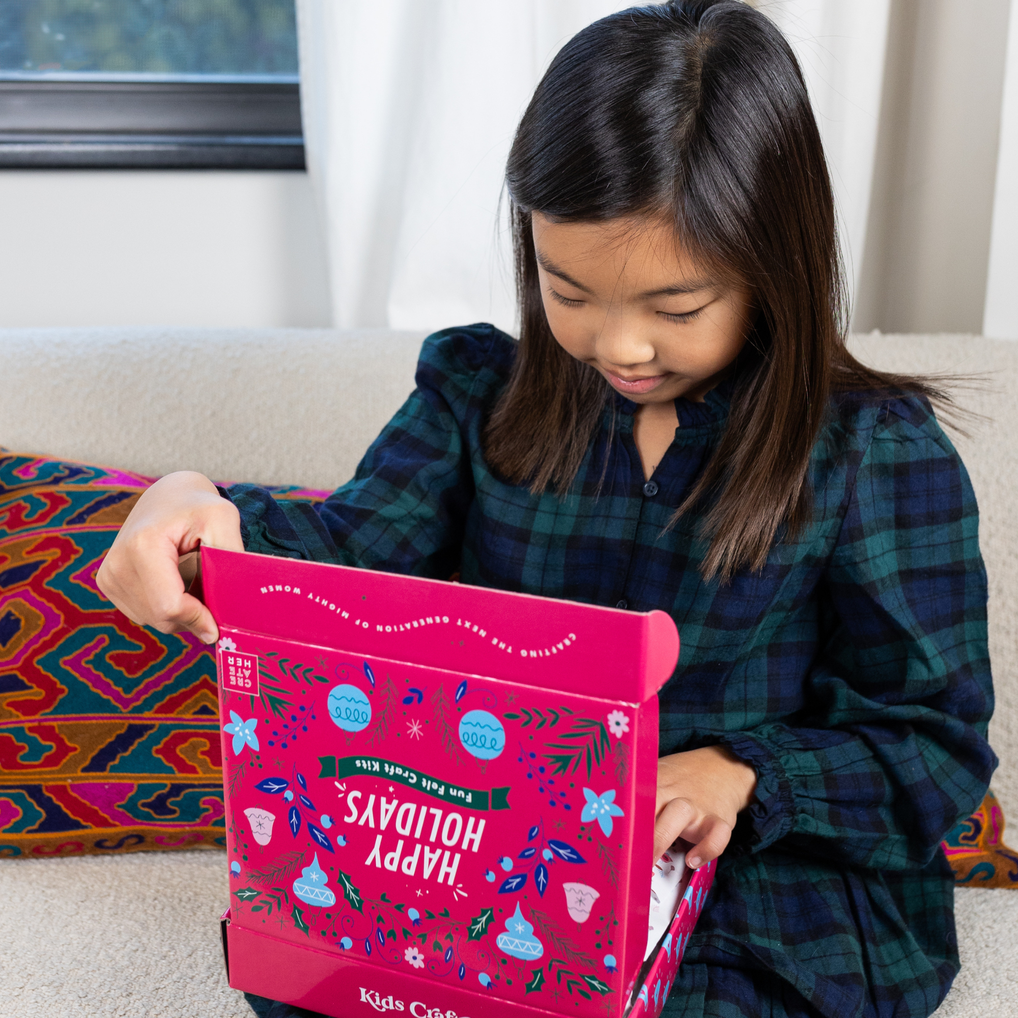 A colorful assortment of Happy Holidays Felt Craft Kits featuring seasonal designs, including snowflakes, Christmas trees, and ornaments, perfect for kids.