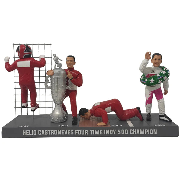 Helio Castroneves 4-Figure Set featuring four hand-painted figurines in a decorative box, showcasing intricate details.
