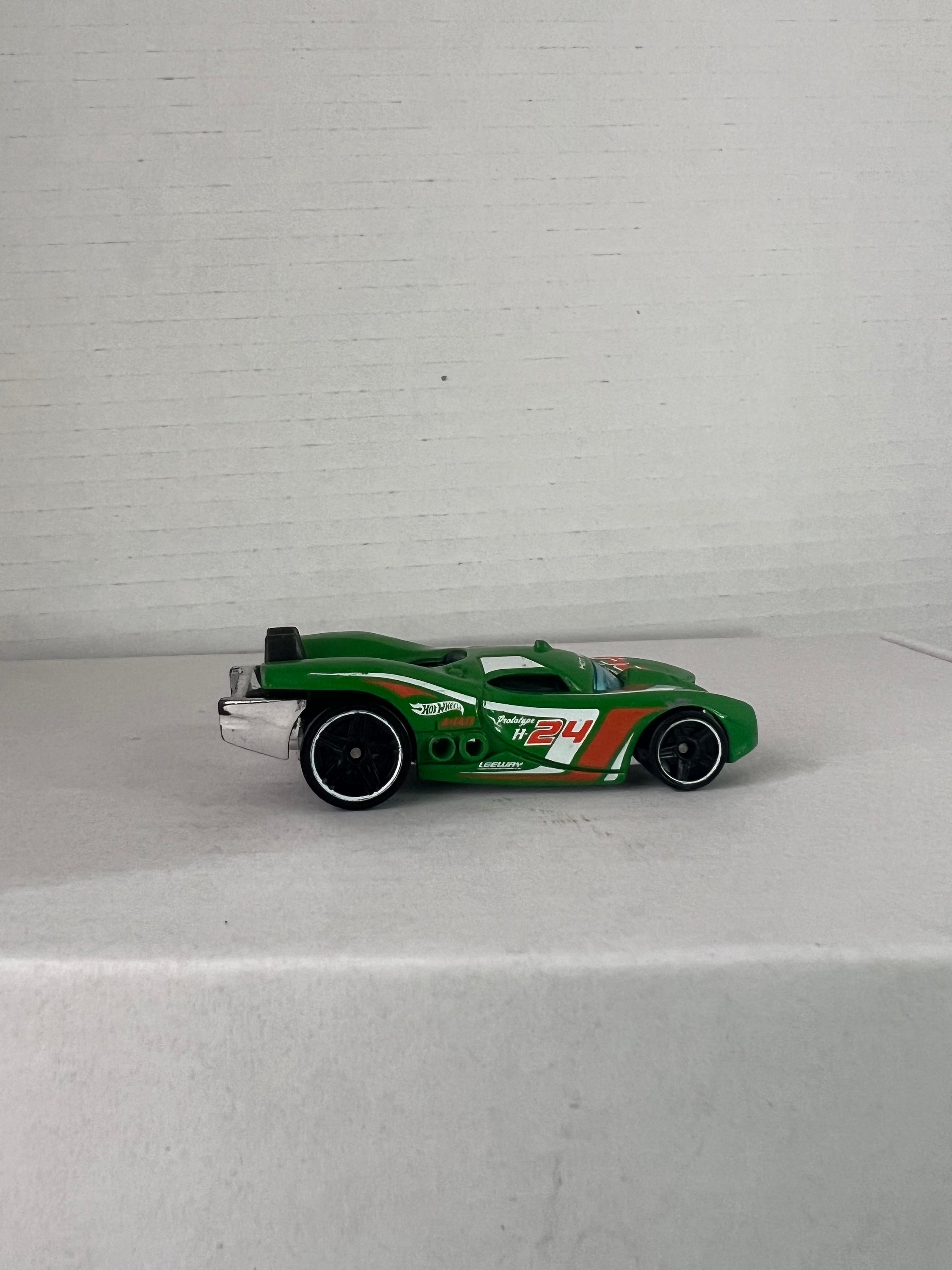 Hot Wheels Prototype H-24 Advent Calendar 2016 in green, showcasing die-cast metal design and intricate details.