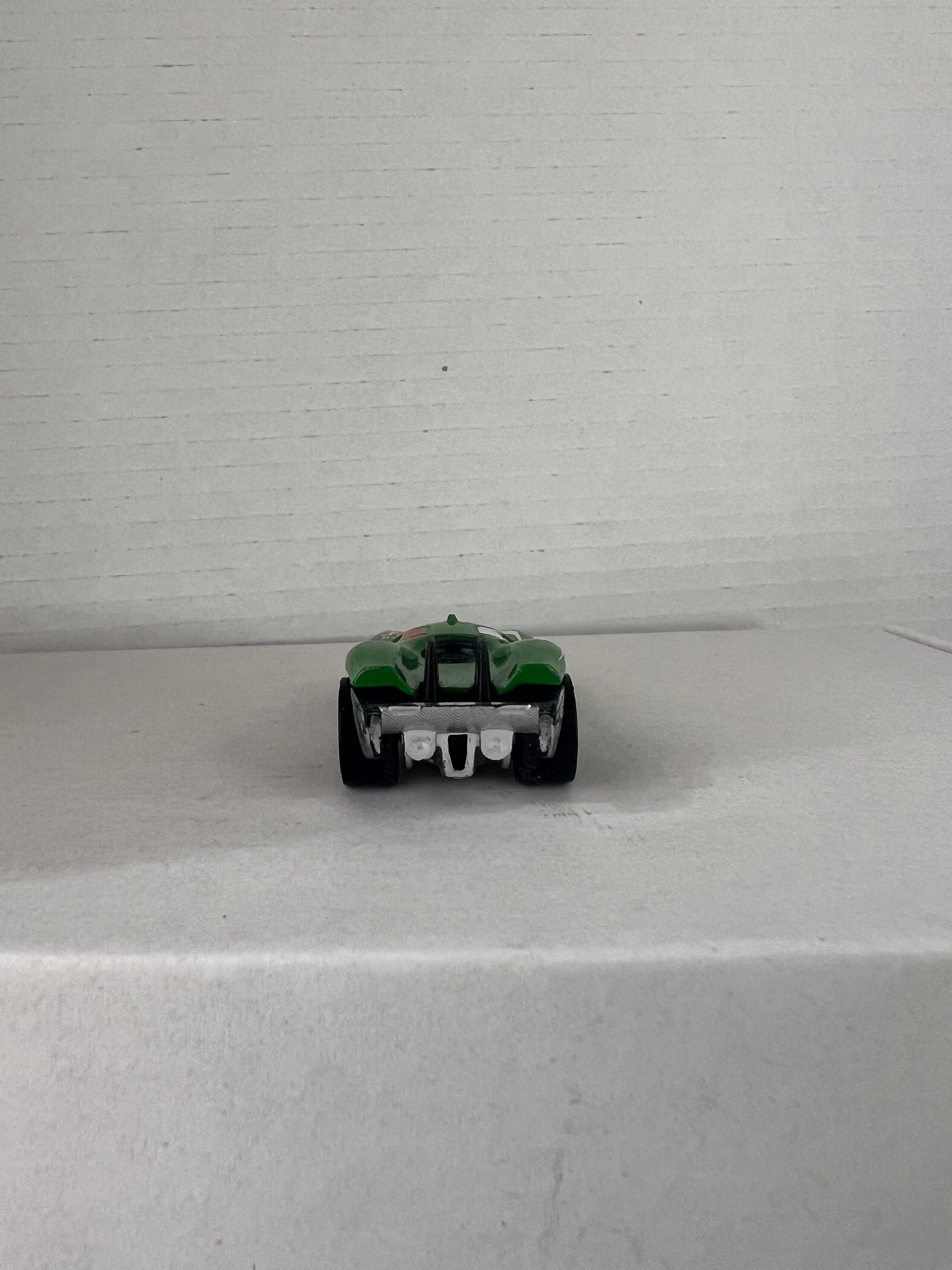 Hot Wheels Prototype H-24 Advent Calendar 2016 in green, showcasing die-cast metal design and intricate details.