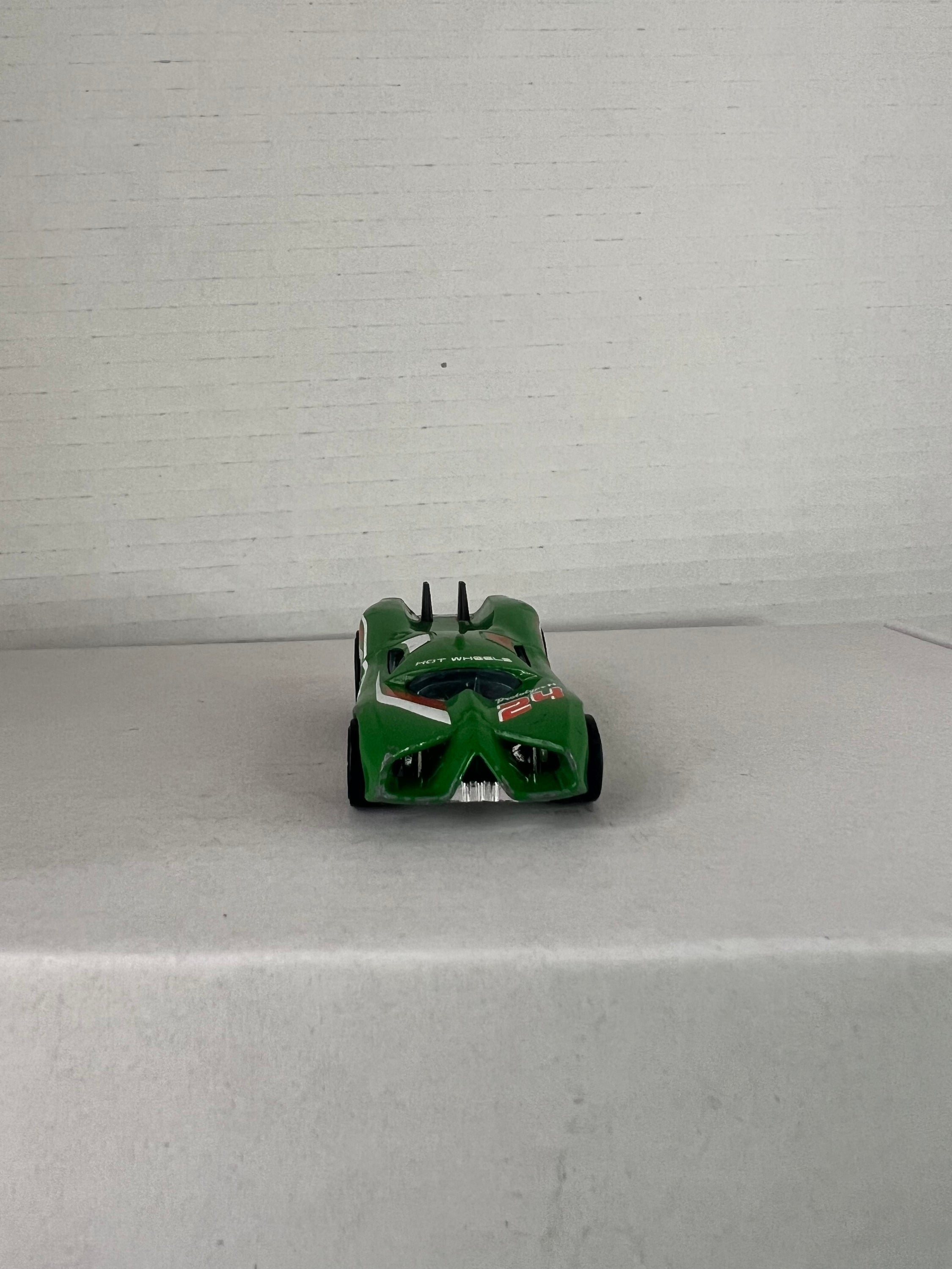 Hot Wheels Prototype H-24 Advent Calendar 2016 in green, showcasing die-cast metal design and intricate details.