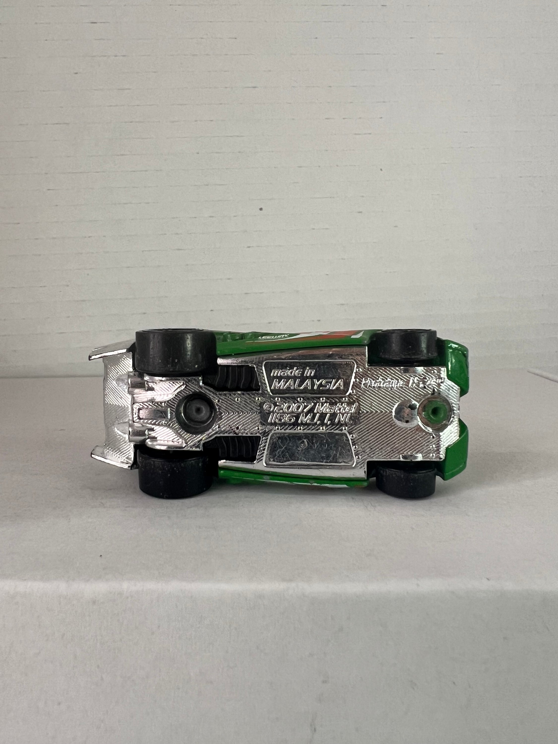 Hot Wheels Prototype H-24 Advent Calendar 2016 in green, showcasing die-cast metal design and intricate details.