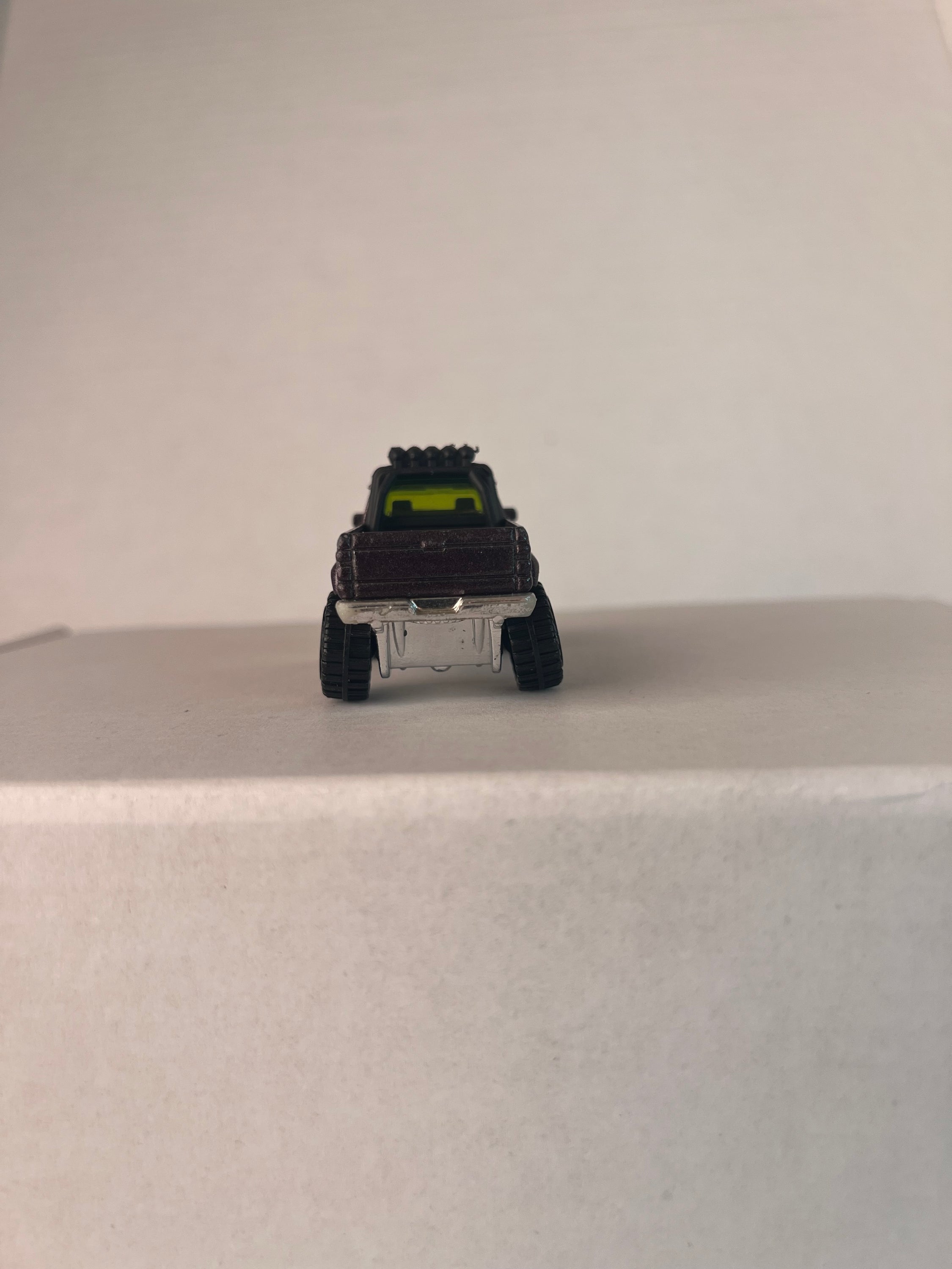 Hot Wheels Retro Series (2016) Target Exclusive featuring '87 Toyota Pickup and '84 Hurst Olds die-cast models in vibrant colors.