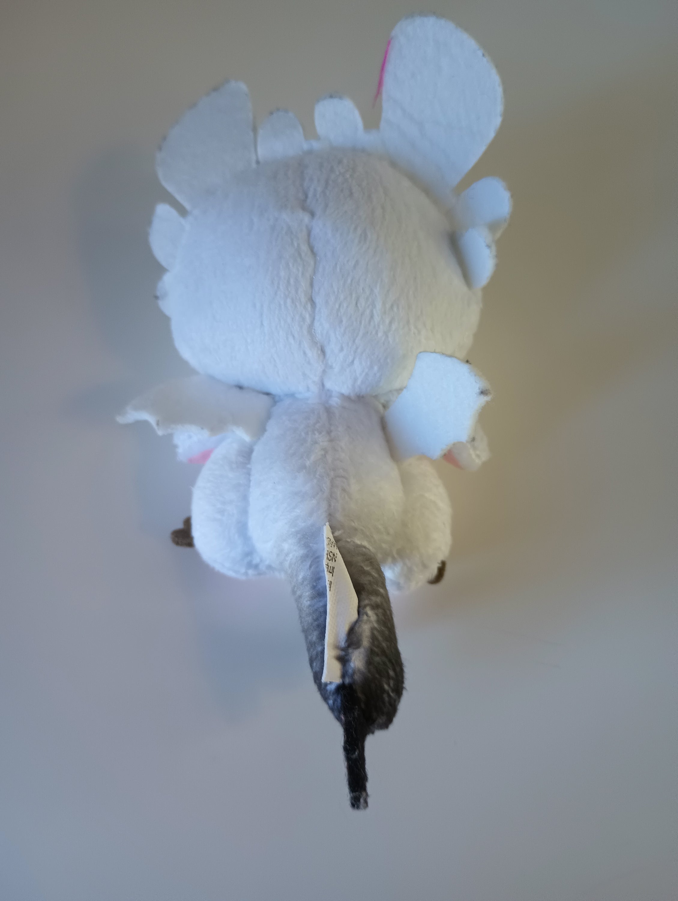 3-inch Light Fury plush toy from How to Train Your Dragon, featuring soft white fur and intricate details, perfect for fans and collectors.