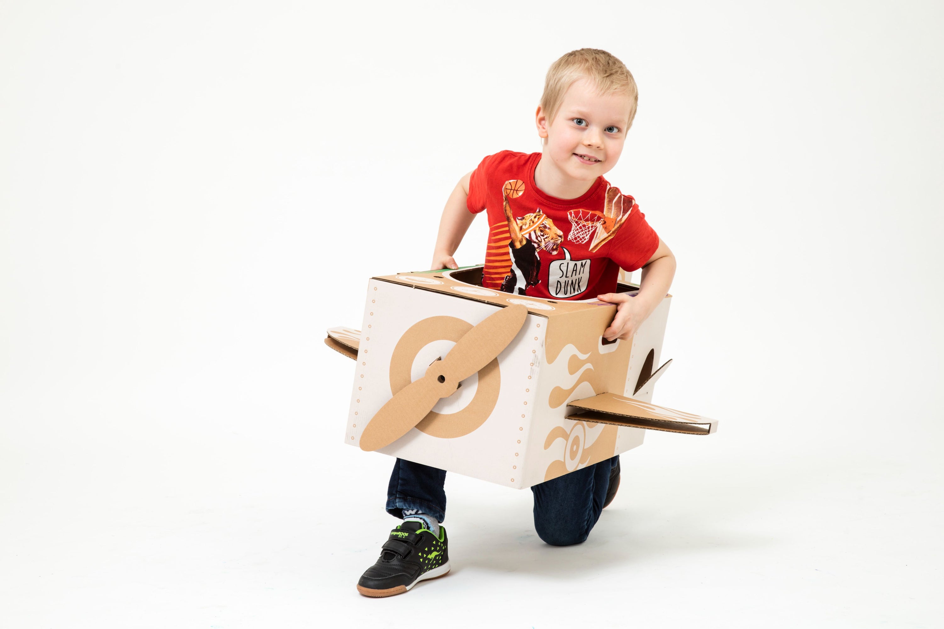 A colorful DIY cardboard airplane for kids, showcasing its strong design and creative decoration options, perfect for imaginative play.