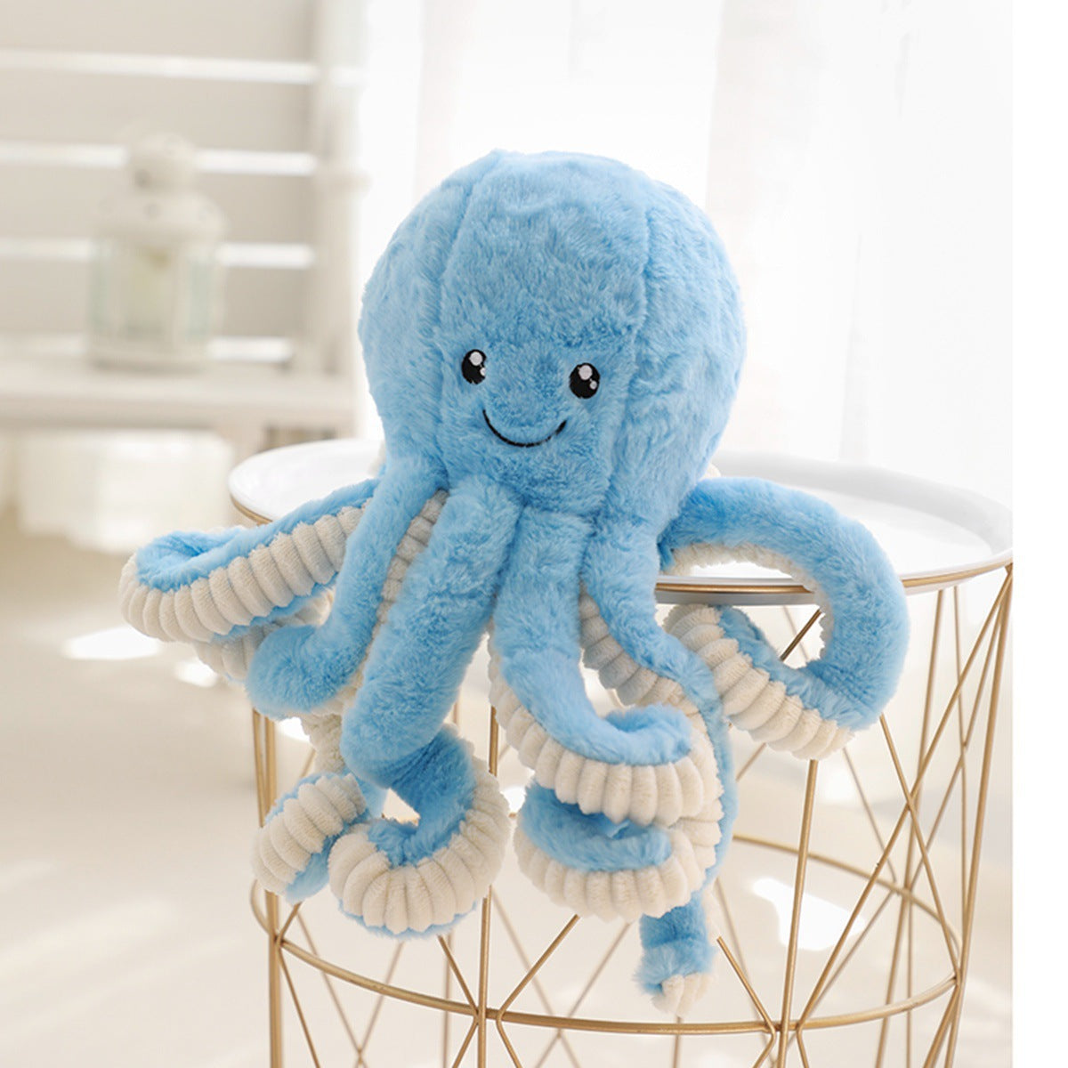Lovely simulation octopus pendant plush stuffed toy with bright eyes and elastic legs, available in multiple colors.
