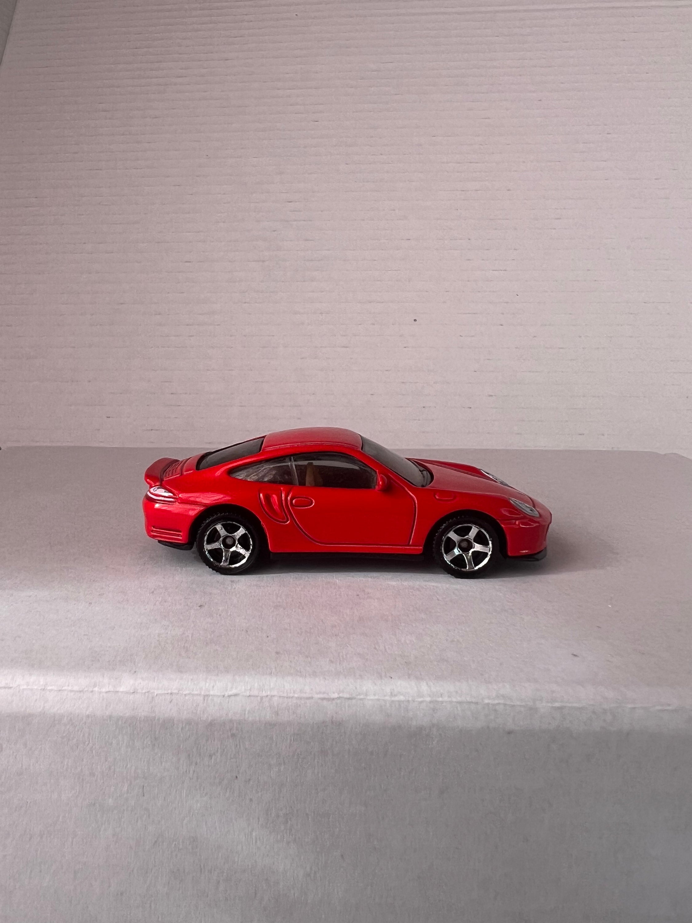 Matchbox Open Road-Sters 2017 set featuring four die-cast cars: Opel Speedster, Porsche 911 Turbo, 1971 Chevy Chevelle, and 1957 Ford Thunderbird.