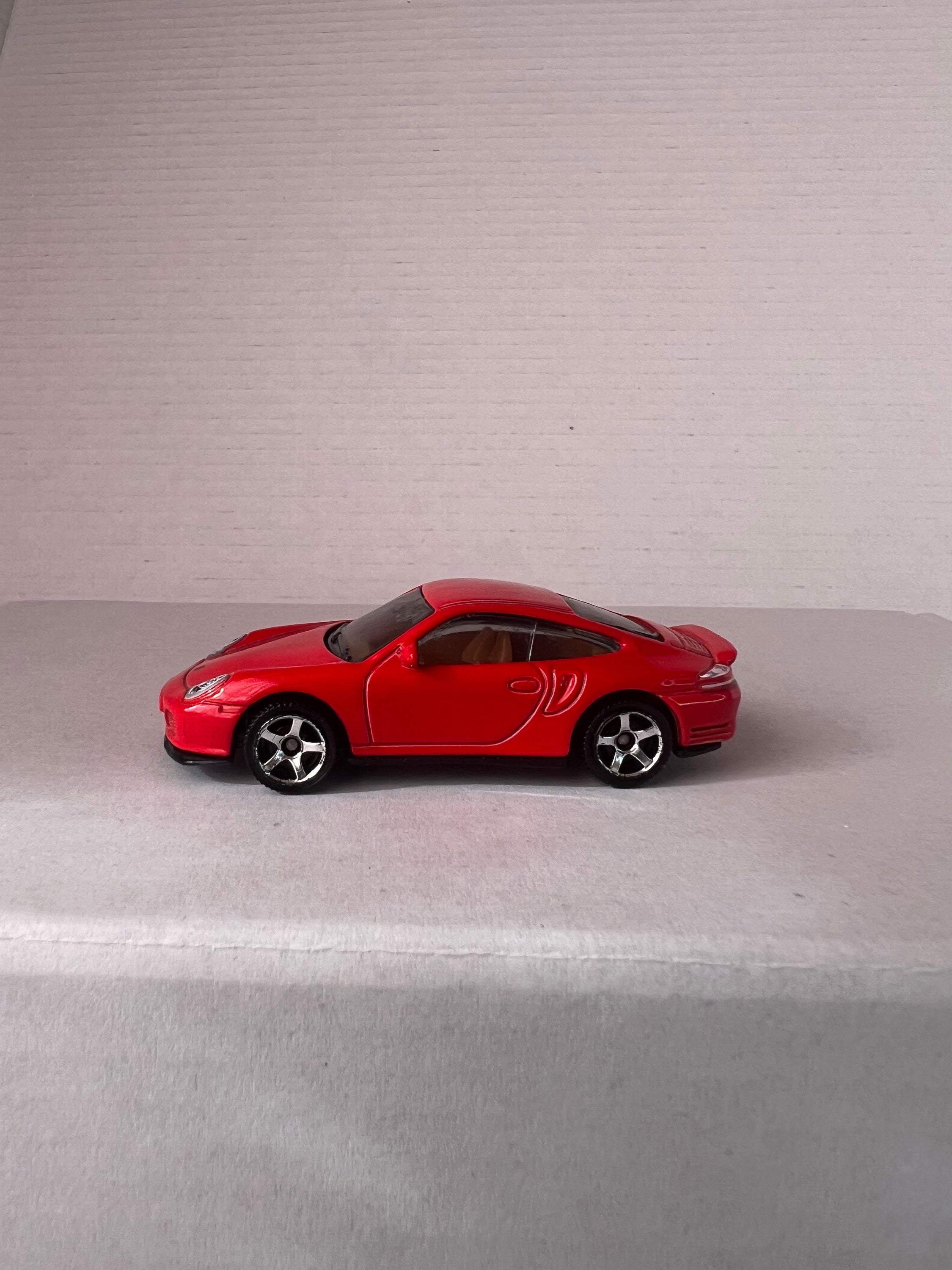 Matchbox Open Road-Sters 2017 set featuring four die-cast cars: Opel Speedster, Porsche 911 Turbo, 1971 Chevy Chevelle, and 1957 Ford Thunderbird.