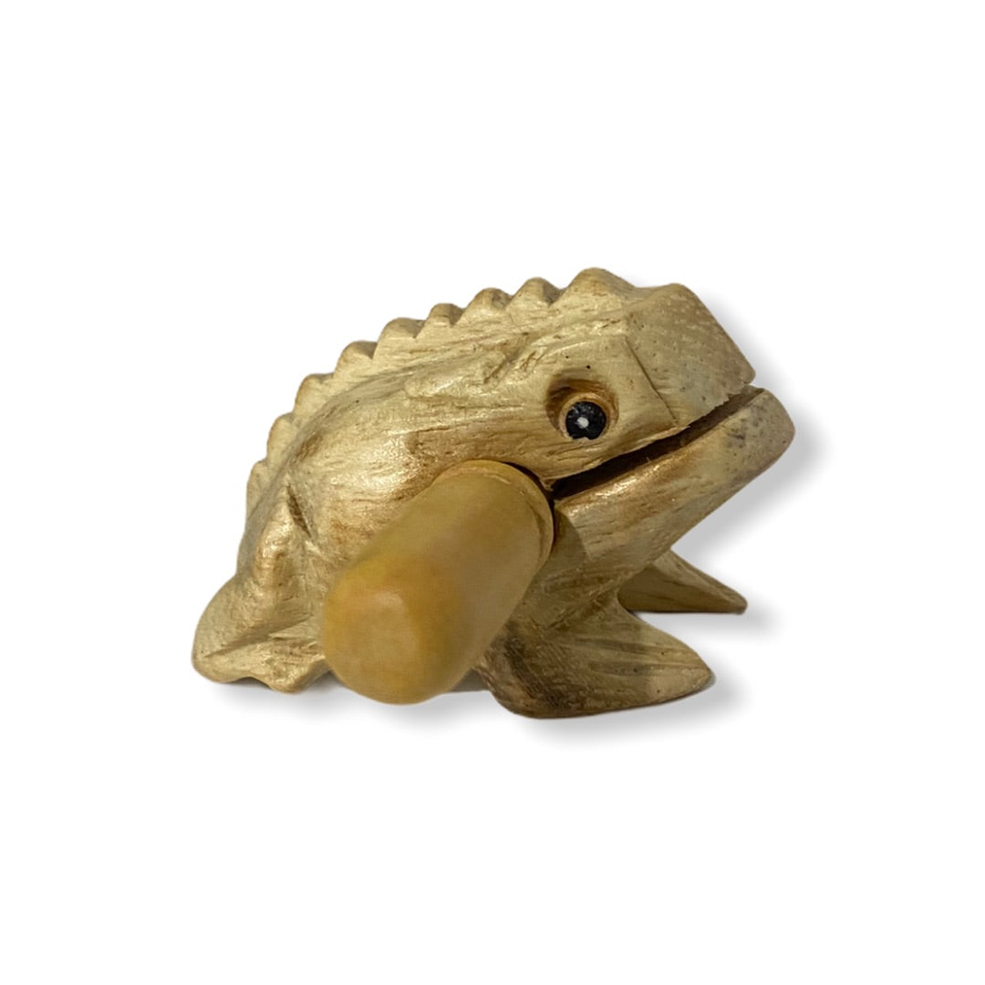 Natural wooden frog with mallet, showcasing craftsmanship and design.