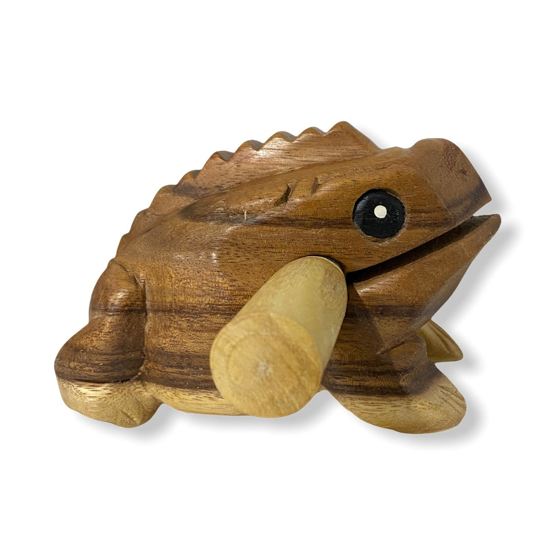 Natural wooden frog with mallet, showcasing craftsmanship and design.