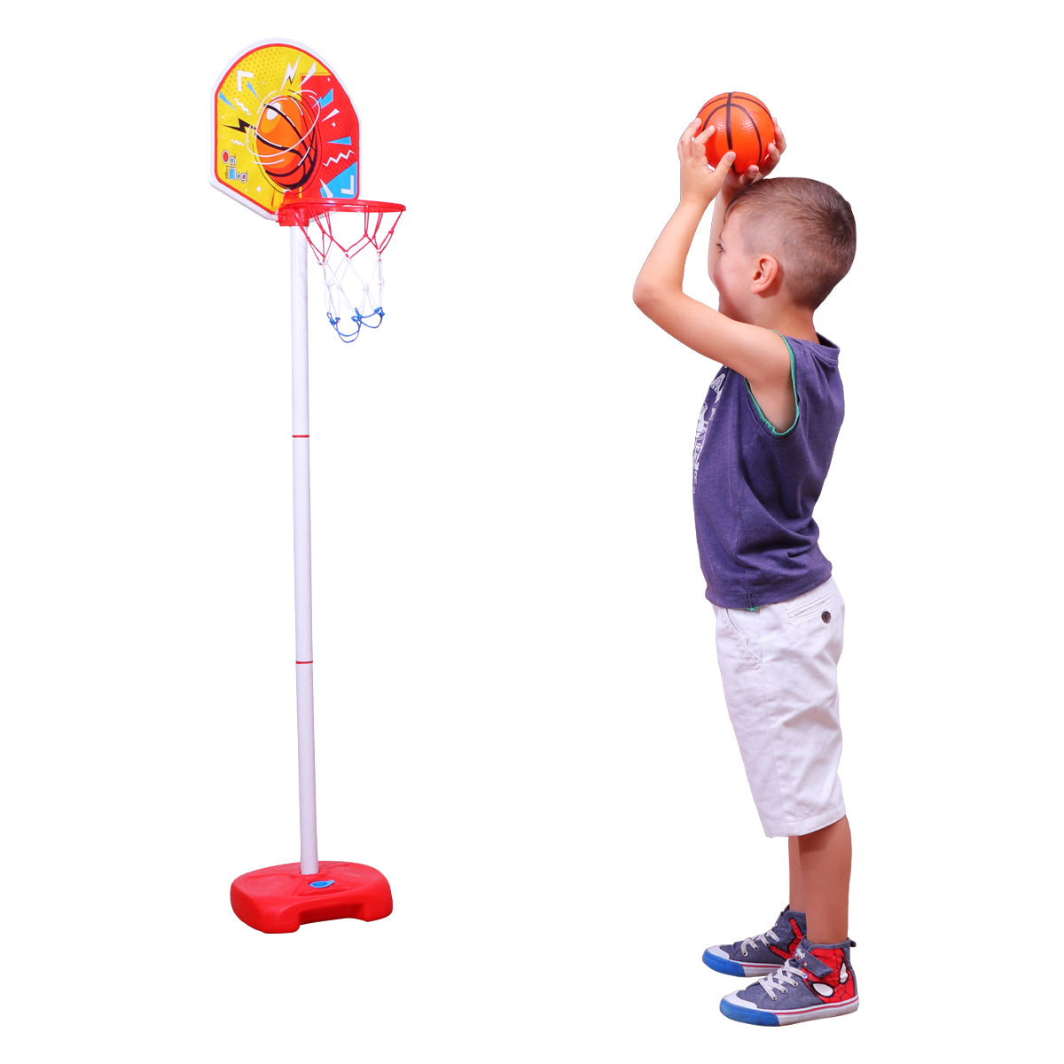 Child playing with toy basketball hoop.