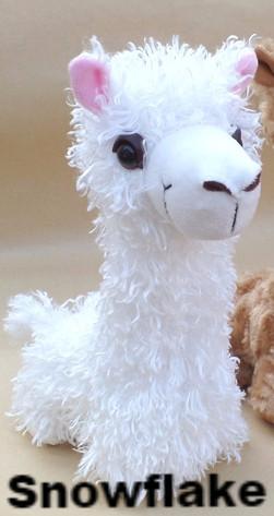 A collection of PacaBuddies Stuffed Alpaca Toys in various colors, showcasing their cute and cuddly design, perfect for alpaca lovers.