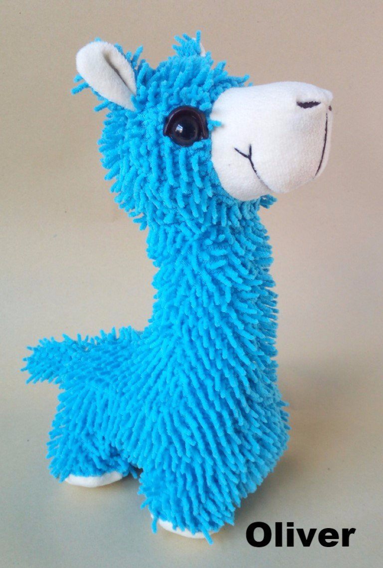 A collection of PacaBuddies Stuffed Alpaca Toys in various colors, showcasing their cute and cuddly design, perfect for alpaca lovers.