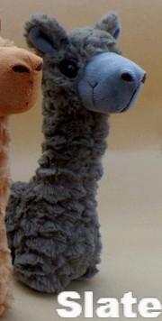 A collection of PacaBuddies Stuffed Alpaca Toys in various colors, showcasing their cute and cuddly design, perfect for alpaca lovers.