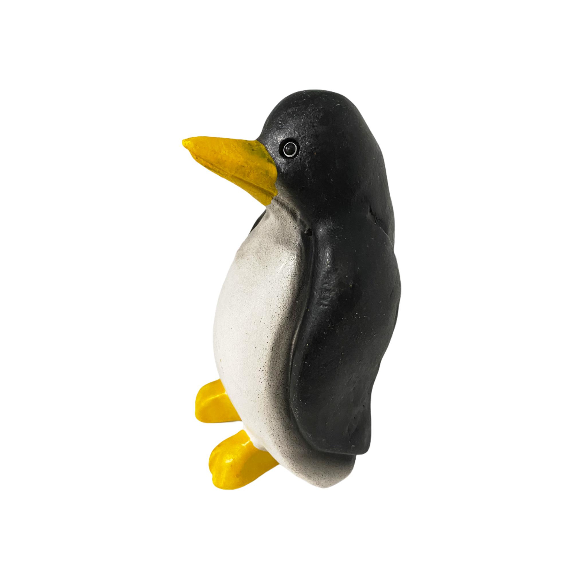A colorful painted wooden penguin whistle instrument, designed for children, showcasing vibrant colors and a charming design.