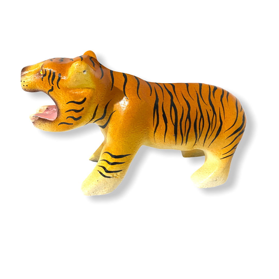 A colorful painted wooden tiger musical whistle instrument, showcasing intricate details and vibrant colors, perfect for children.