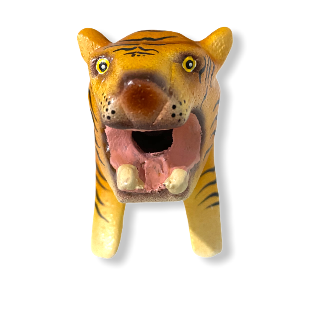 A colorful painted wooden tiger musical whistle instrument, showcasing intricate details and vibrant colors, perfect for children.