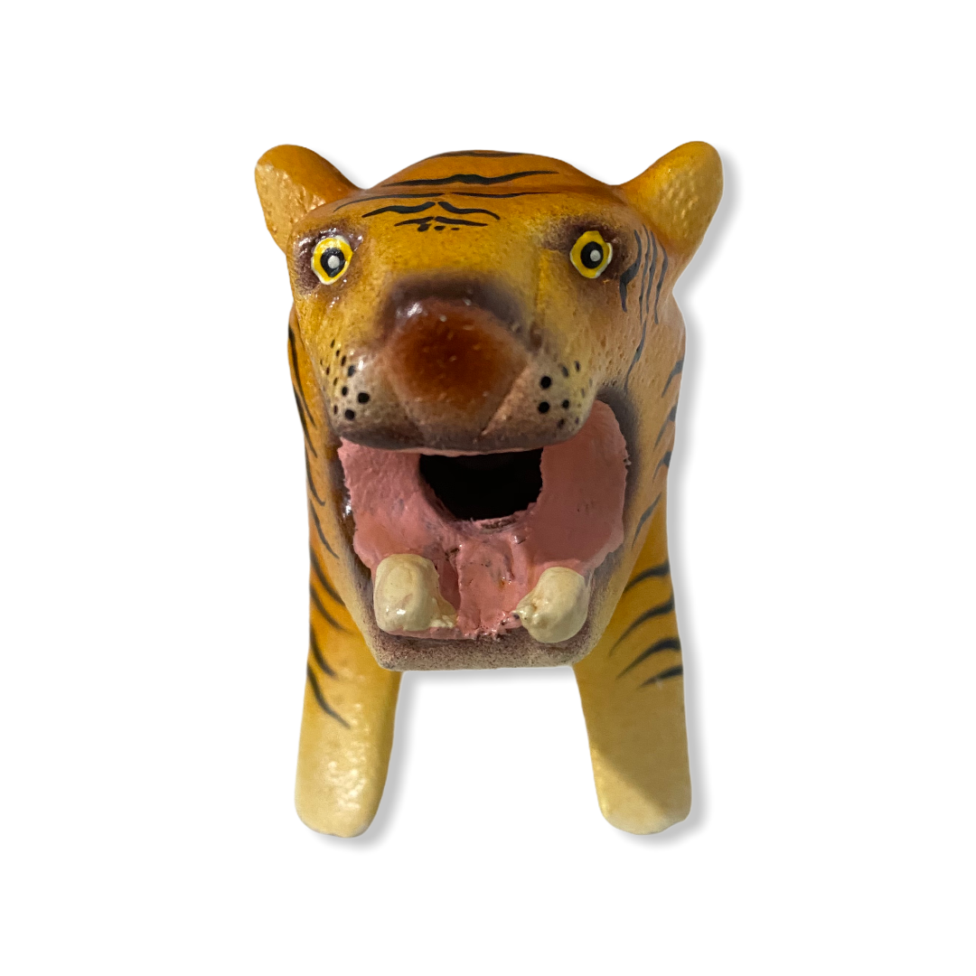 A colorful painted wooden tiger musical whistle instrument, showcasing intricate details and vibrant colors, perfect for children.