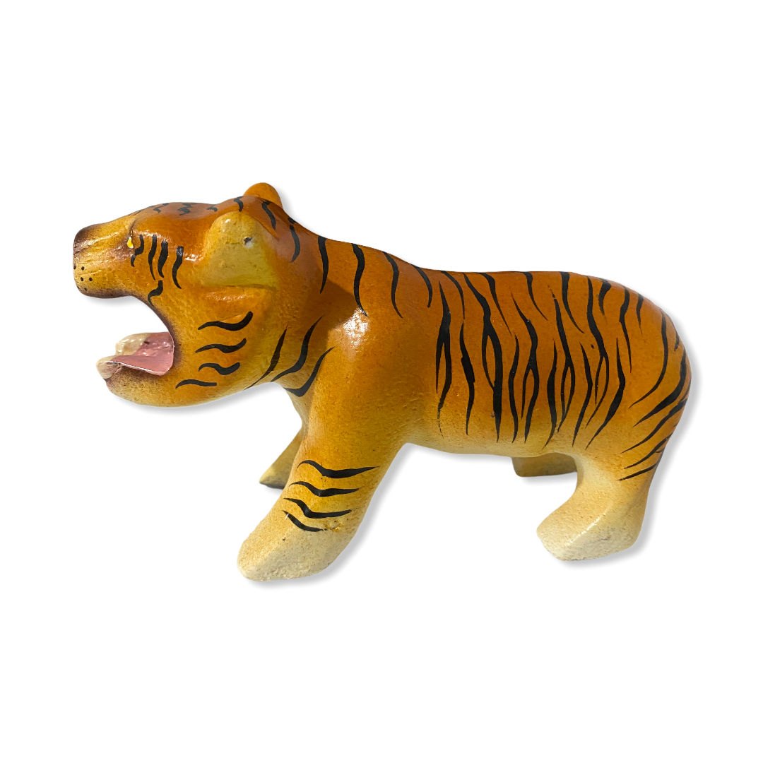 A colorful painted wooden tiger musical whistle instrument, showcasing intricate details and vibrant colors, perfect for children.