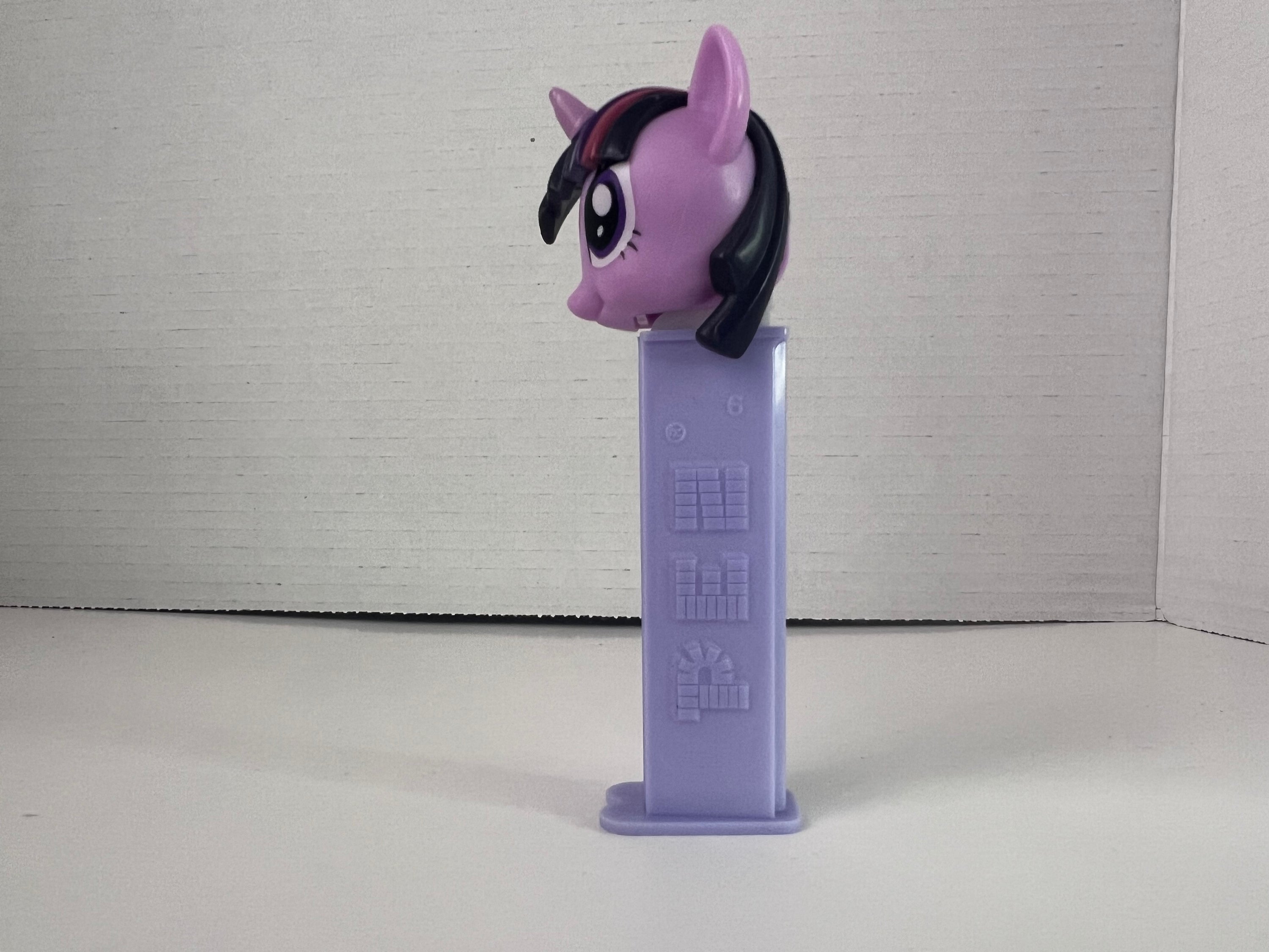 Pez dispenser featuring My Little Pony character Twilight Sparkle, colorful and collectible.