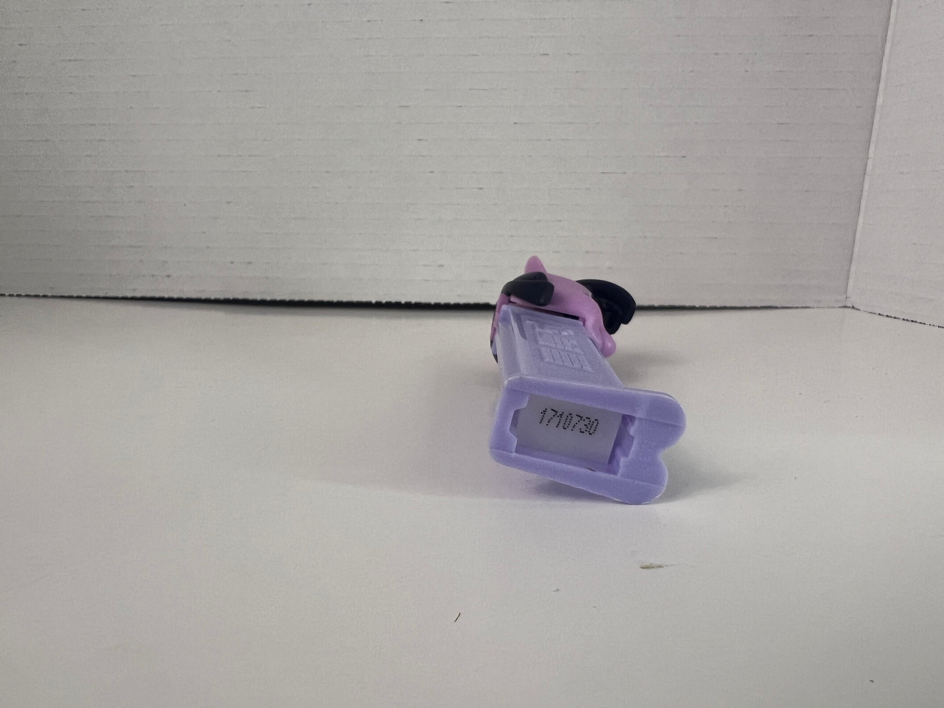 Pez dispenser featuring My Little Pony character Twilight Sparkle, colorful and collectible.