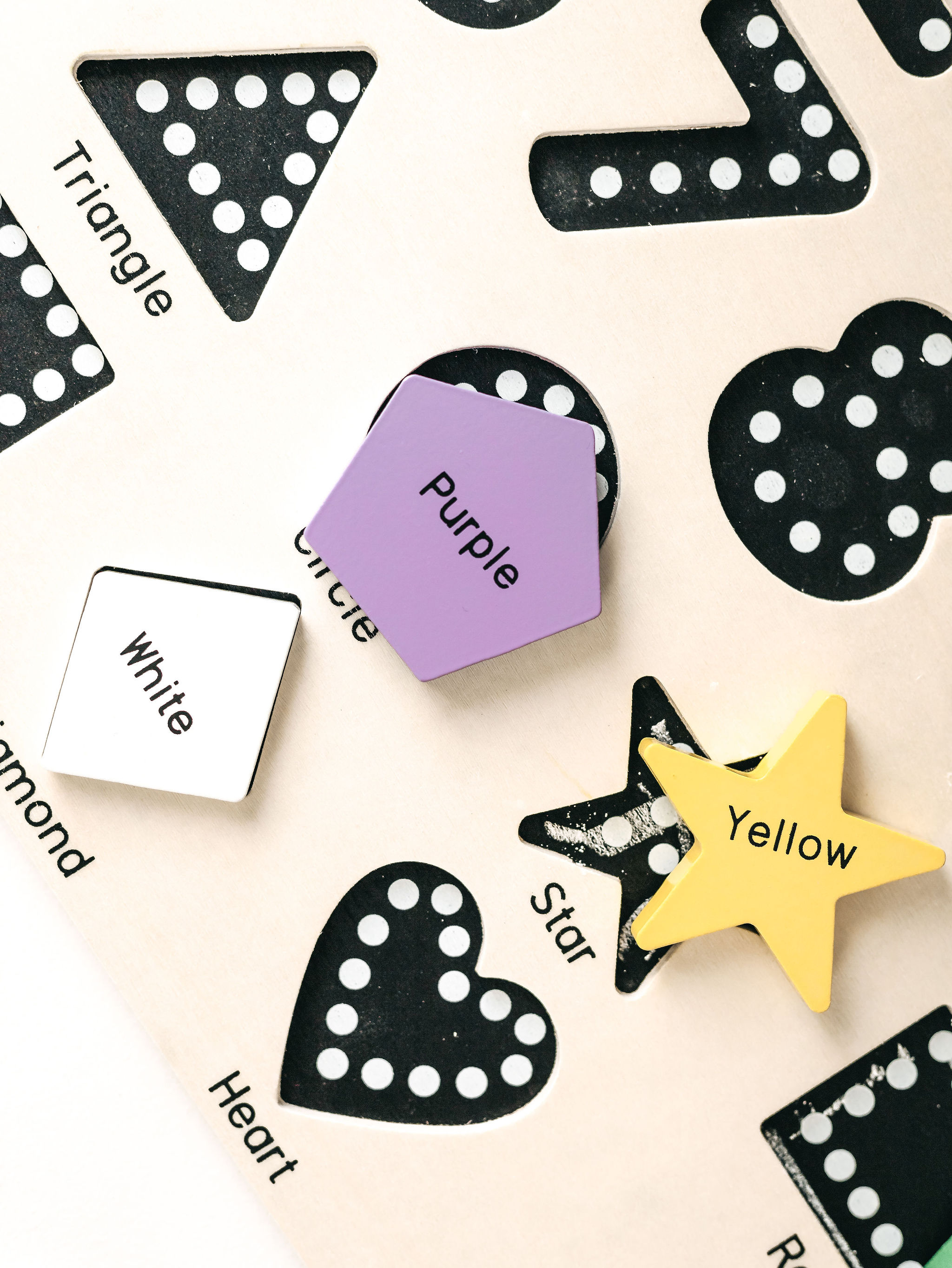 A colorful Preschool Chalkboard Puzzle featuring numbers, shapes, and colors designed for young learners to trace and practice writing.