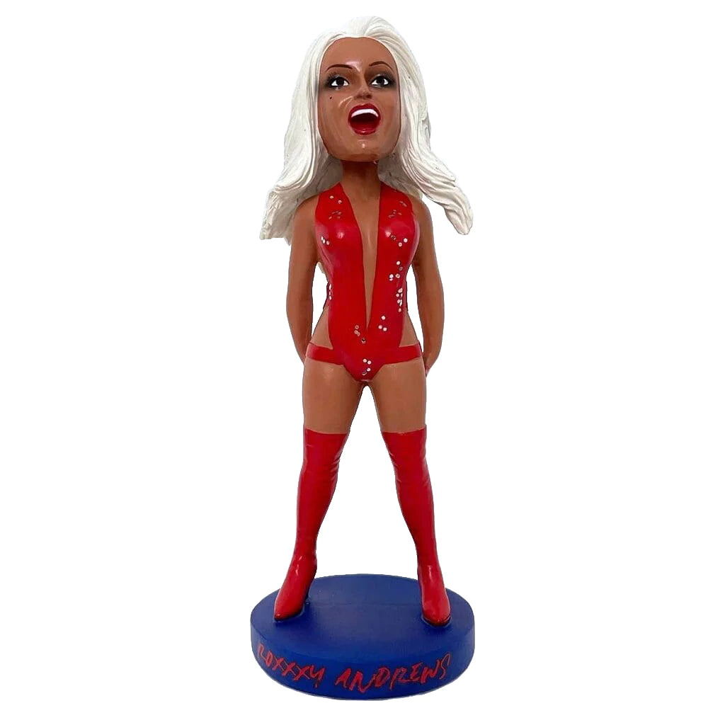 Roxxxy Andrews Bobblehead showcasing her iconic drag look, hand-sculpted and hand-painted, standing 8 inches tall in a colorful collector's box.