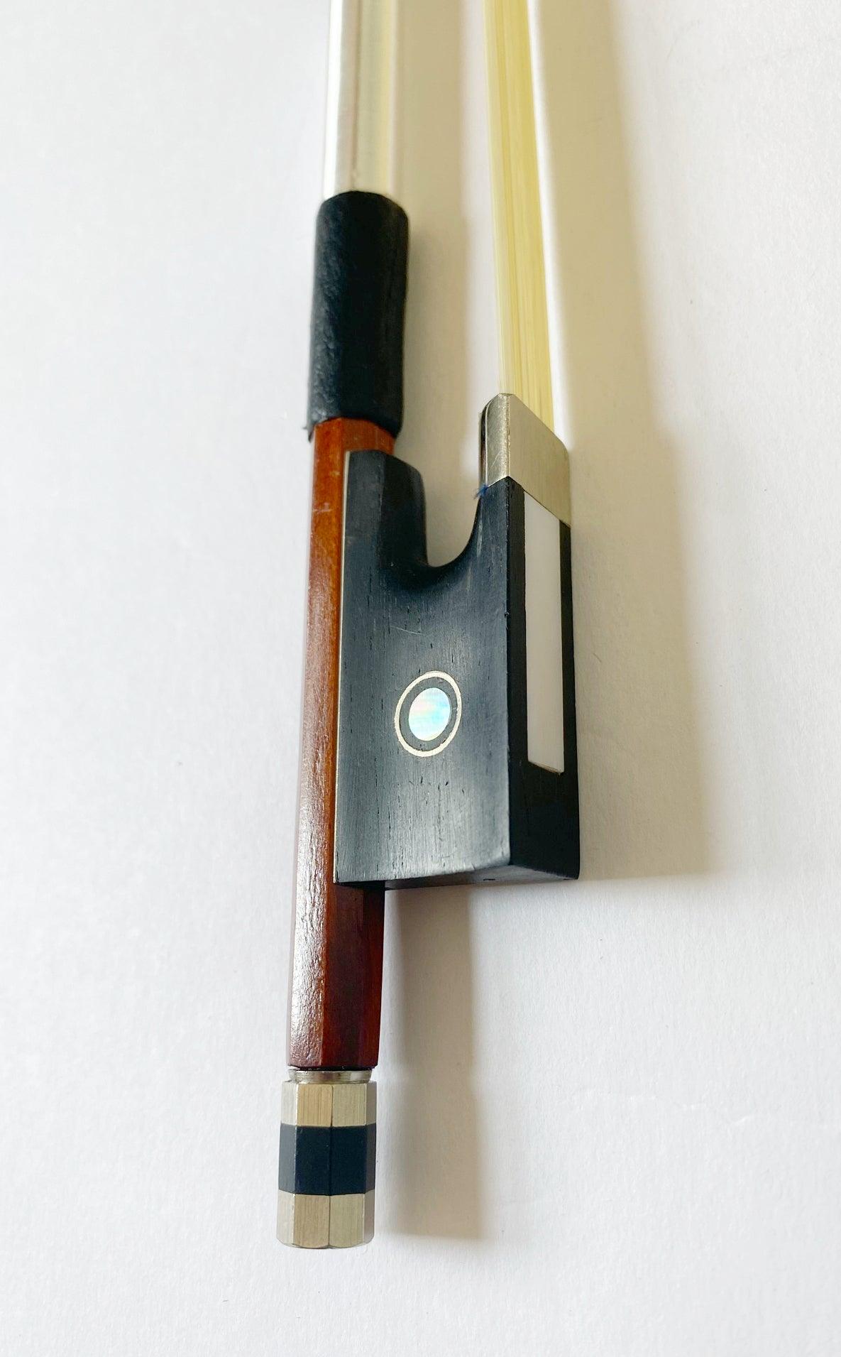 Rozanna's Camo Violin Outfit featuring pink and green glitter designs with crystal details, complete with bow and case.