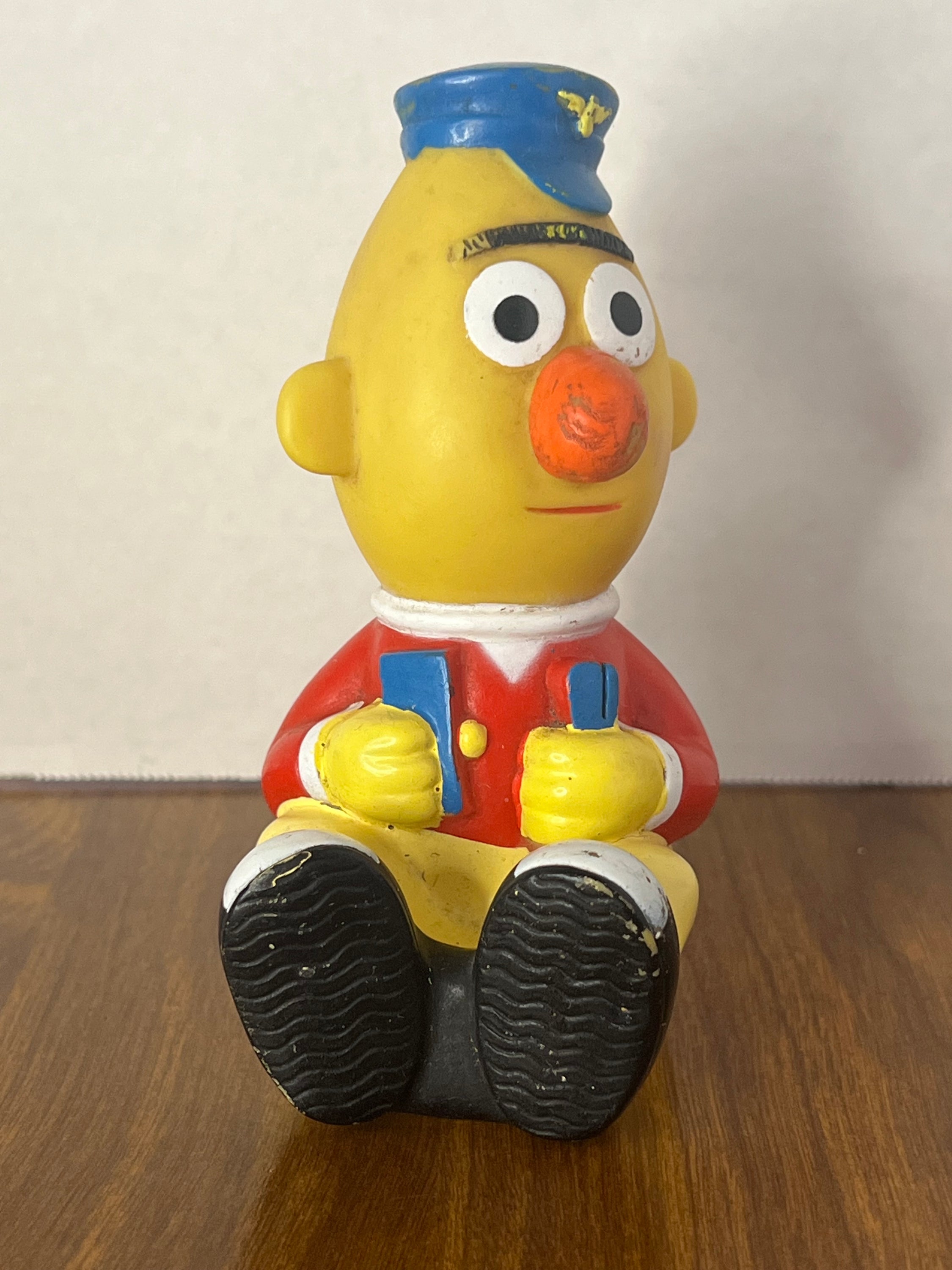 1989 Sesame Street Big Bird's Wind Up Train featuring Bert, colorful toy with minor paint wear, perfect for collectors.