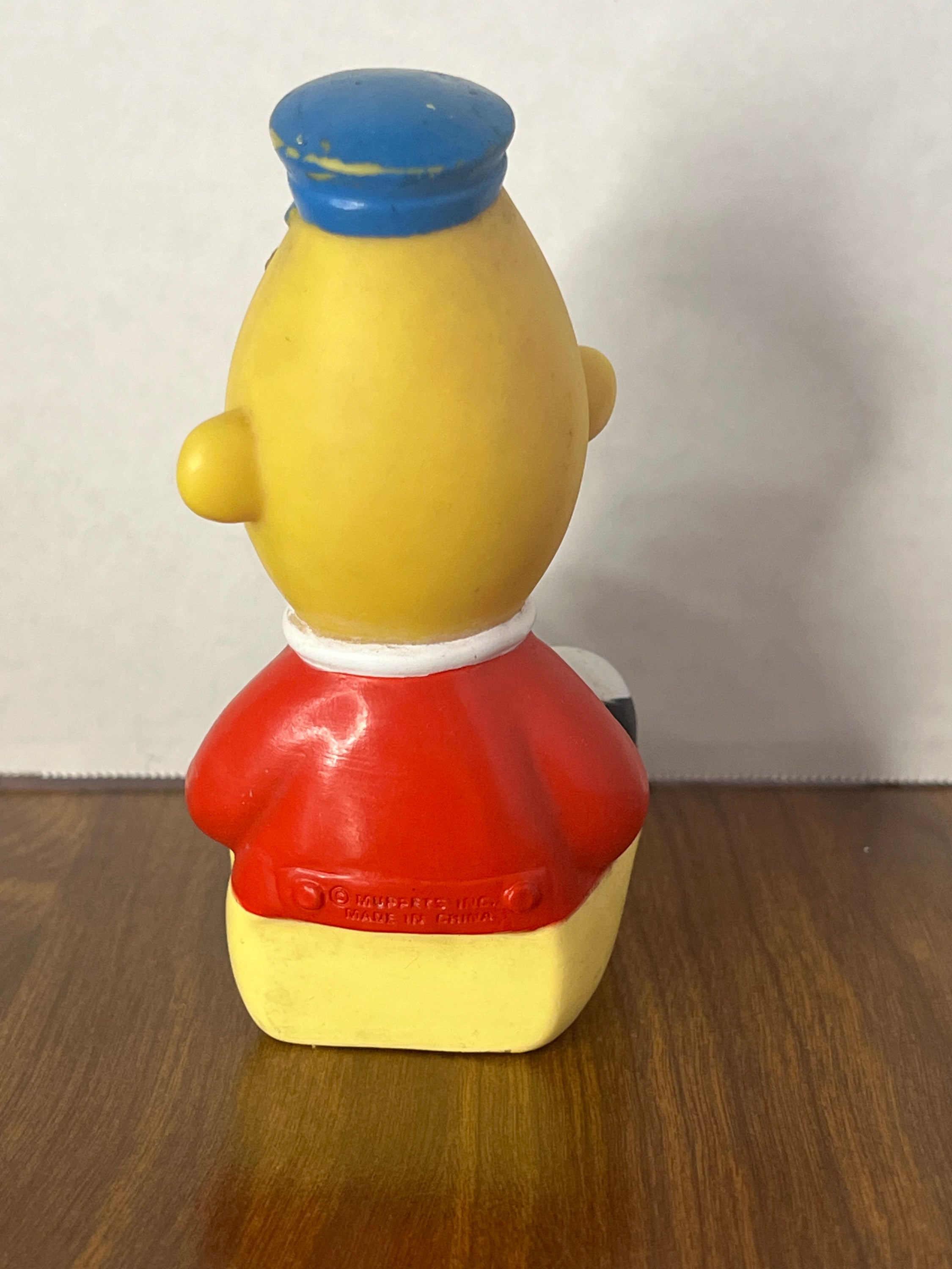 1989 Sesame Street Big Bird's Wind Up Train featuring Bert, colorful toy with minor paint wear, perfect for collectors.