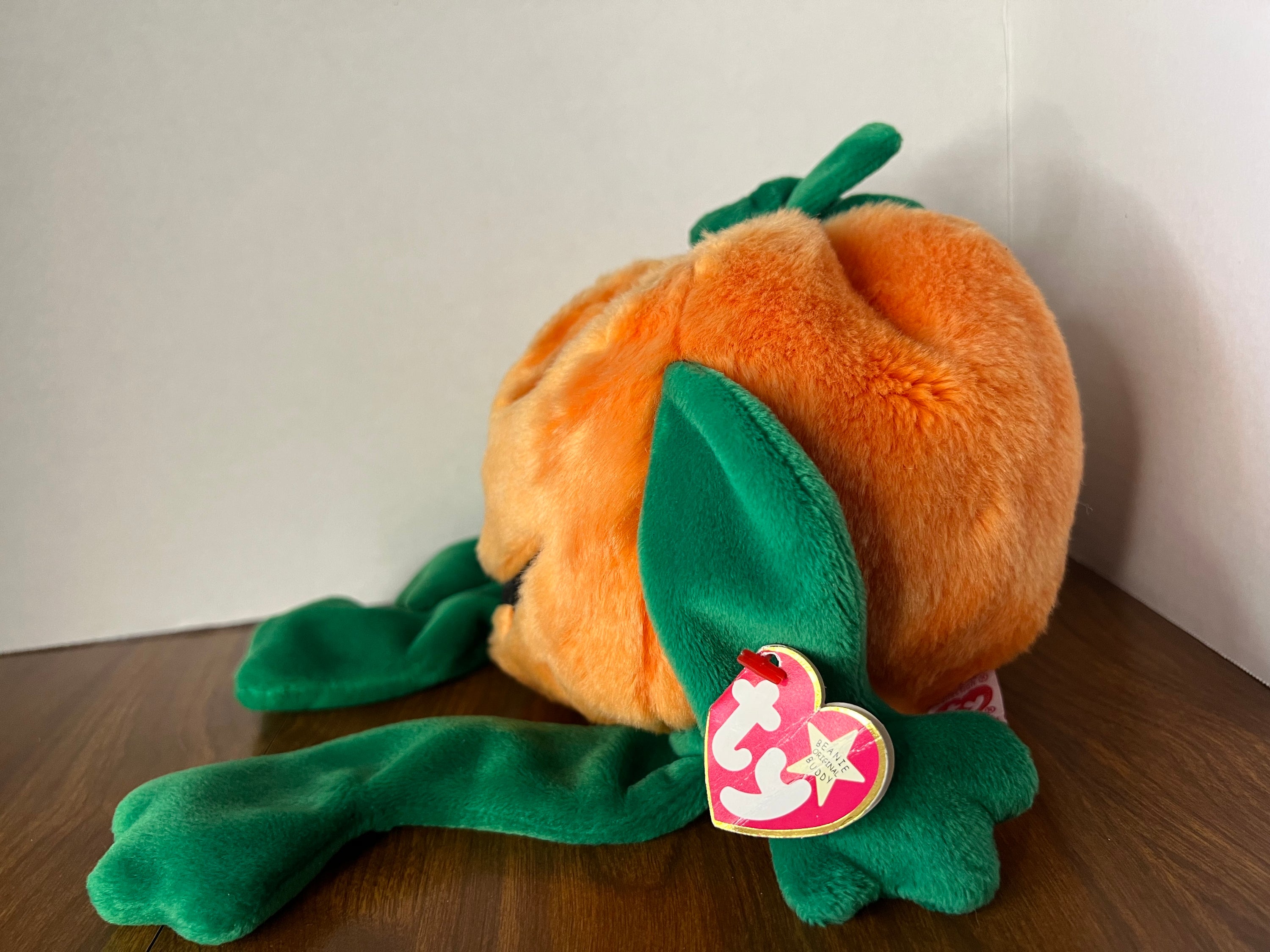 1999 Beanie Babies Collection Pumkin plush toy, bright orange with a cute design, perfect for collectors and children.