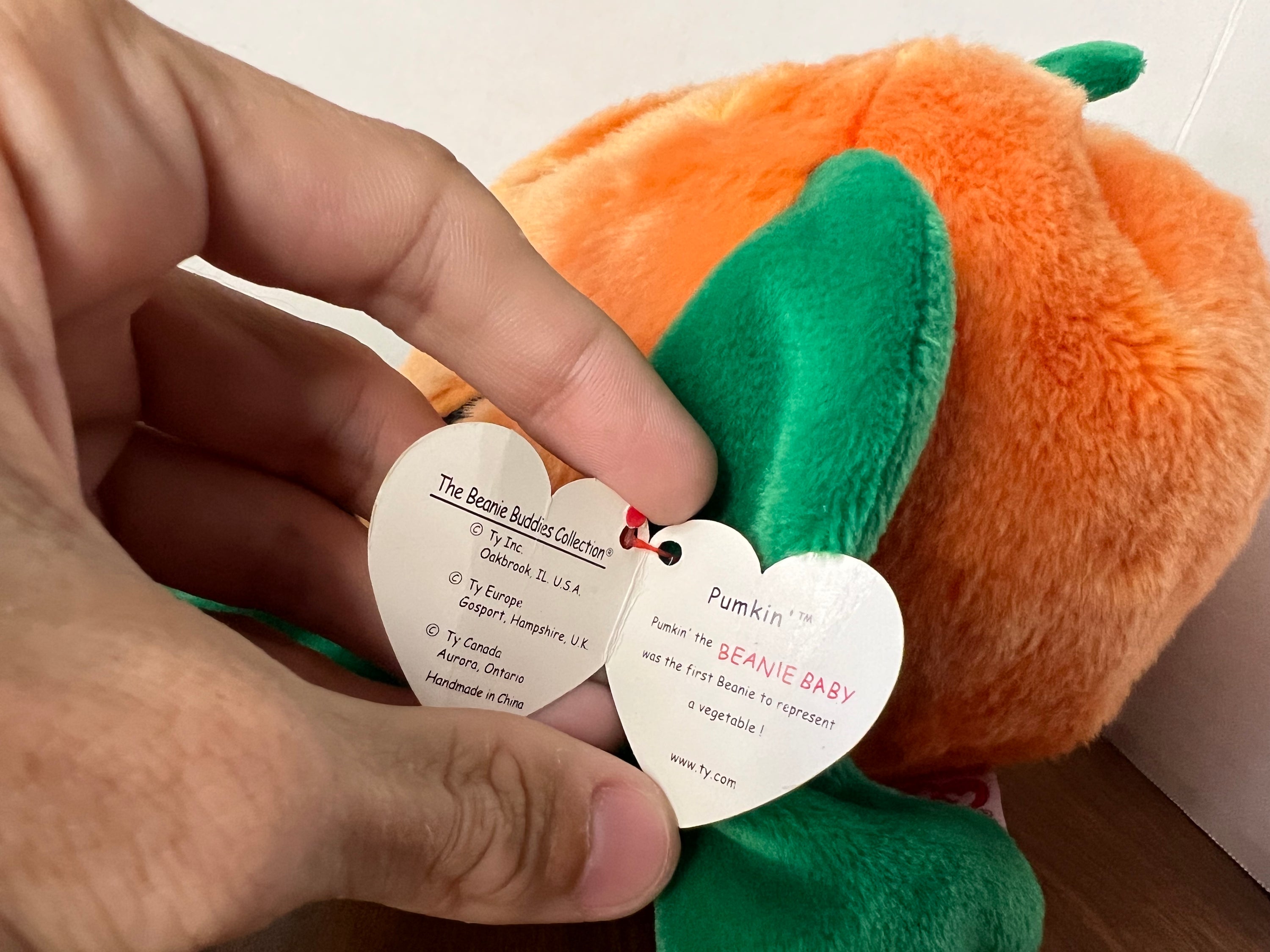 1999 Beanie Babies Collection Pumkin plush toy, bright orange with a cute design, perfect for collectors and children.