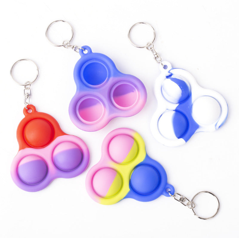 Three Finger Bubble Silicone Key Chain in vibrant colors, designed for stress relief and fun, featuring three finger bubbles for popping.
