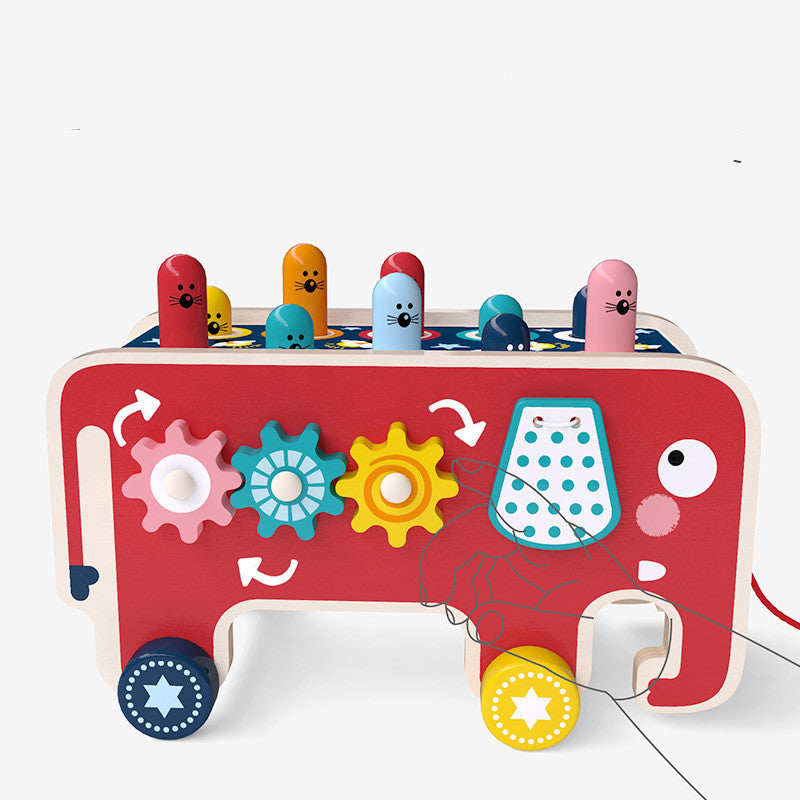 Colorful wooden pounding bench toy featuring cute animal designs for toddlers, promoting motor skills and sensory development.