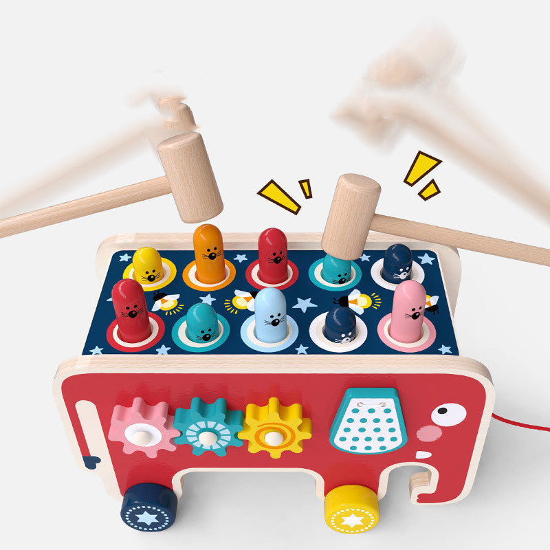 Colorful wooden pounding bench toy featuring cute animal designs for toddlers, promoting motor skills and sensory development.